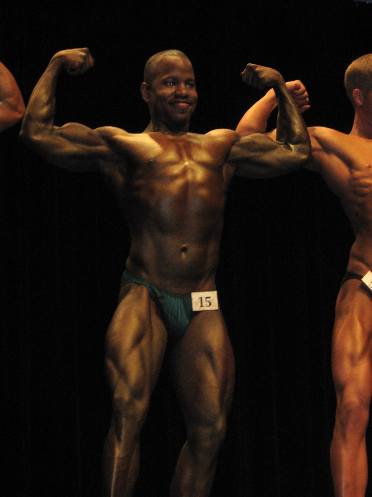 LIBERTY, Mo. - Capt. Michael Boswell, 509th Logistics Readiness Squadron, poses on stage April 20 at the 2008 Natural Southern States Classic body building competition. Captain Boswell came in 4th place in his division at the 2008 Natural Southern States Classic. (Photo printed with permission of Captain Boswell)