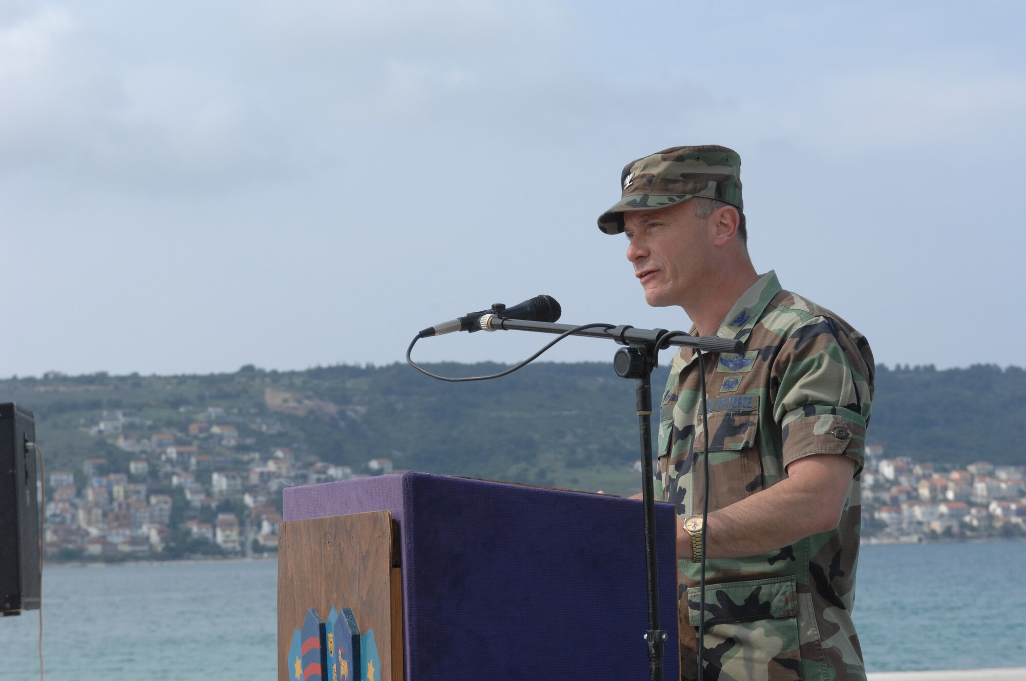 DIVULJE TRAINING BASE, Croatia – U.S. Air Force Col. Kevin Ross, MEDCEUR commander, gives his final remarks May 14 during the closing ceremony of the 2008 Medical Training Exercise in Central and Eastern Europe (MEDCEUR) here.  Fifteen nations are participating in the exercise from May 2 through 14. The exercise focuses on mass-casualty training scenarios and humanitarian aid in response to crises situations. MEDCEUR is a Joint Chiefs of Staff regional/multilateral exercise sponsored by U.S. European Command. Croatia is hosting the 2008 exercise which has drawn about 400 multi-nationals in support of the Partnership for Peace initiative. (U.S. Air Force photo/Staff Sgt. Kristin Ruleau) 