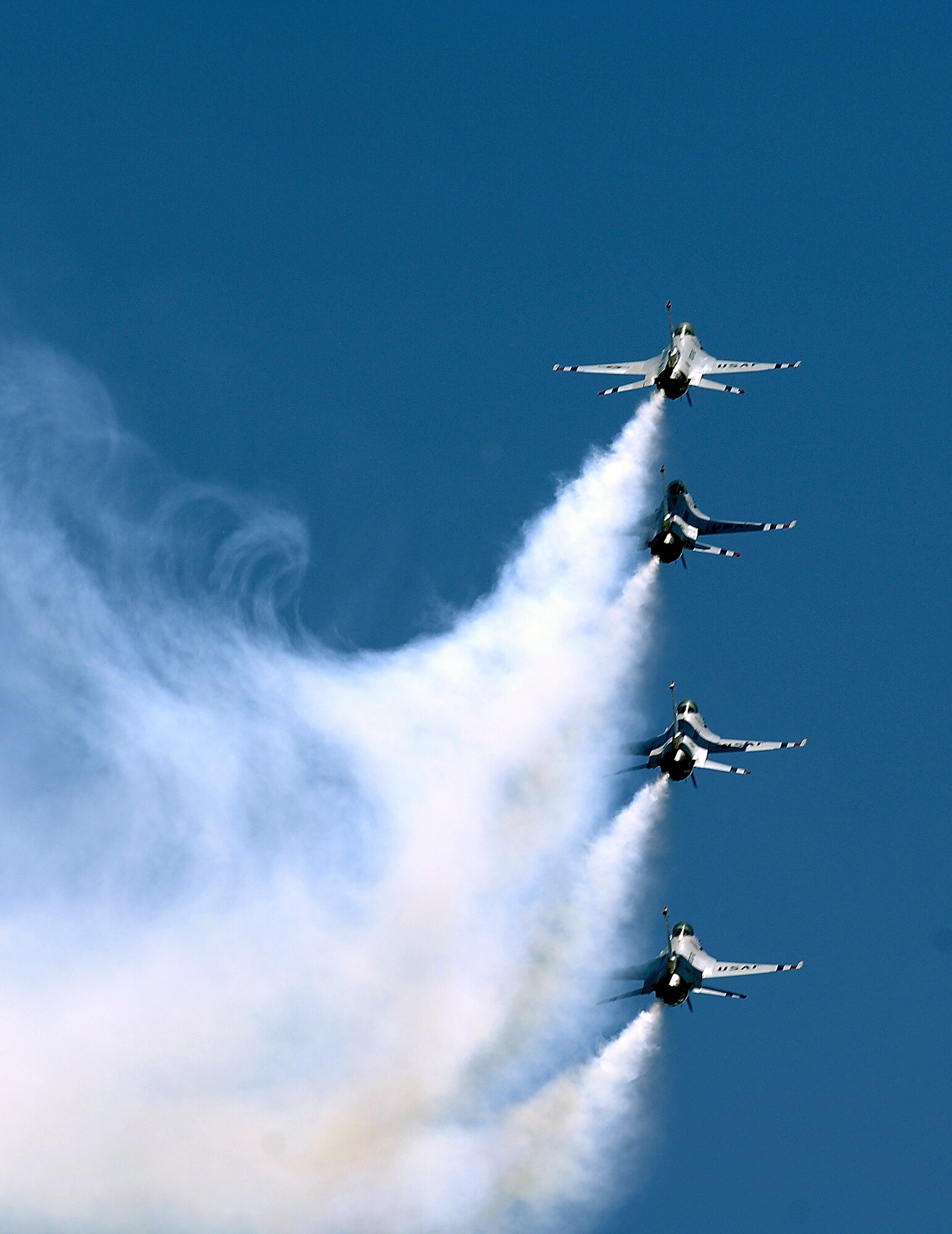 U.S. Air Force Thunderbirds fly in formation at the March ARB AirFest '08.  The AirFest features both military and civilian aerial and ground demostrations during the two day airshow, May 3-4, 2008 at March Air Reserve Base, Riverside, California. (U.S. Air Force photo by SrA Matthew Smith) 
