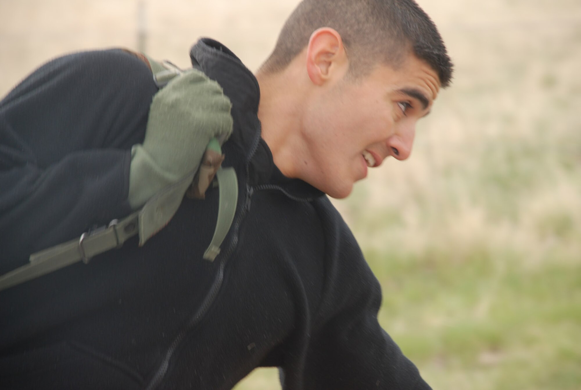 Senior Airman Jorge Richardson, 90th Security Forces Squadron, carries a weighted ruck sack during the obstacle portion of the National Police Week competition Wednesday. 