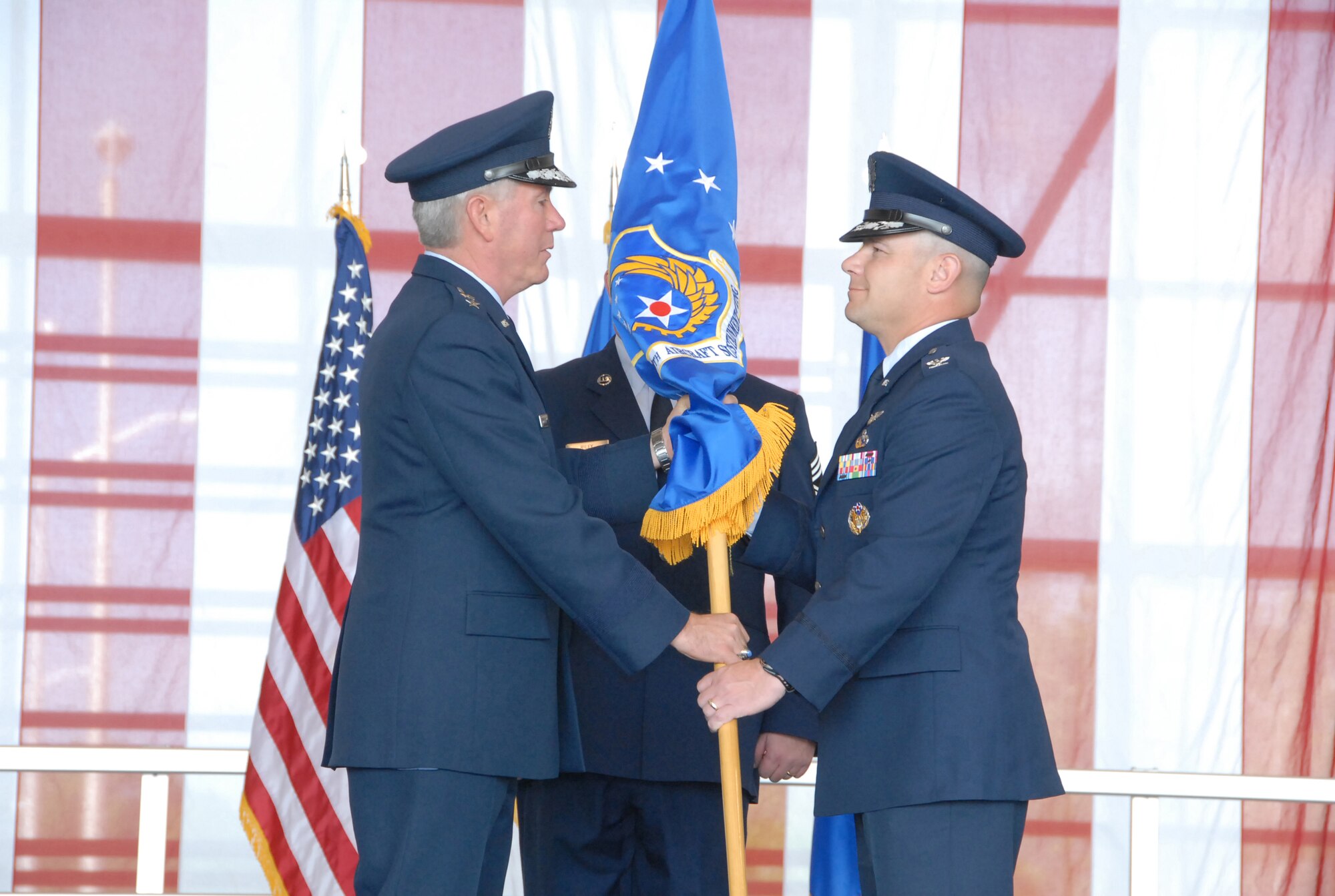 Colonel Tim B. Freeman, right, assumed command of the 330th Aircraft Sustainment Wing from Major General Thomas J. Owen, Commander, Warner Robins Air Logistics Center on May 9, in a Center Change of Command Ceremony. Col. Freeman replaces Colonel Terence R. Szanto. U. S. Air Force photo by Raymond Crayton