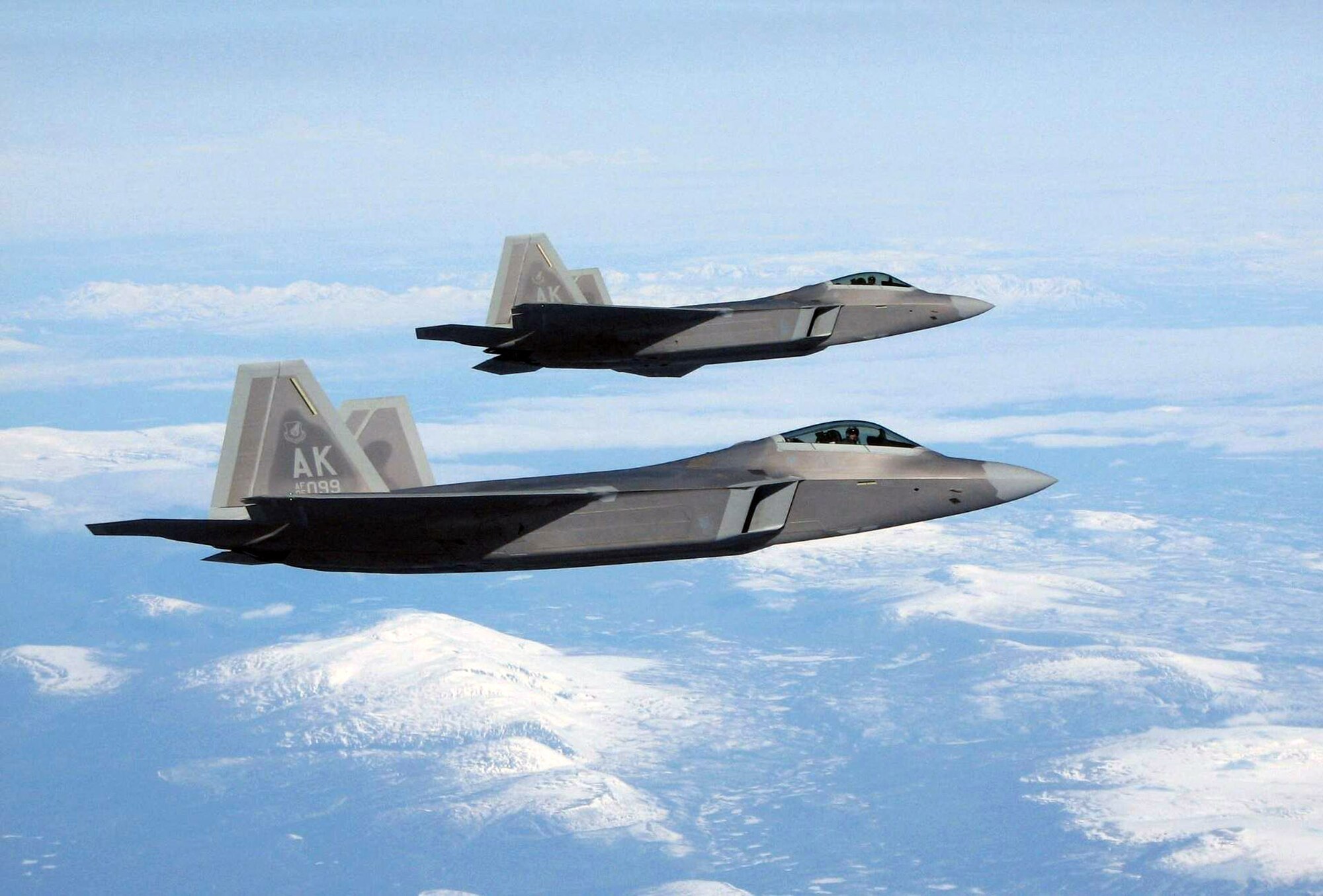 Two F-22 Raptors fly a Northern Edge 2008 training mission over Alaska May 8. The aircraft are from the 3rd Wing at Elmendorf Air Force Base, Alaska. (U.S. Air Force photo/Tech. Sgt. Mikal Canfield)
