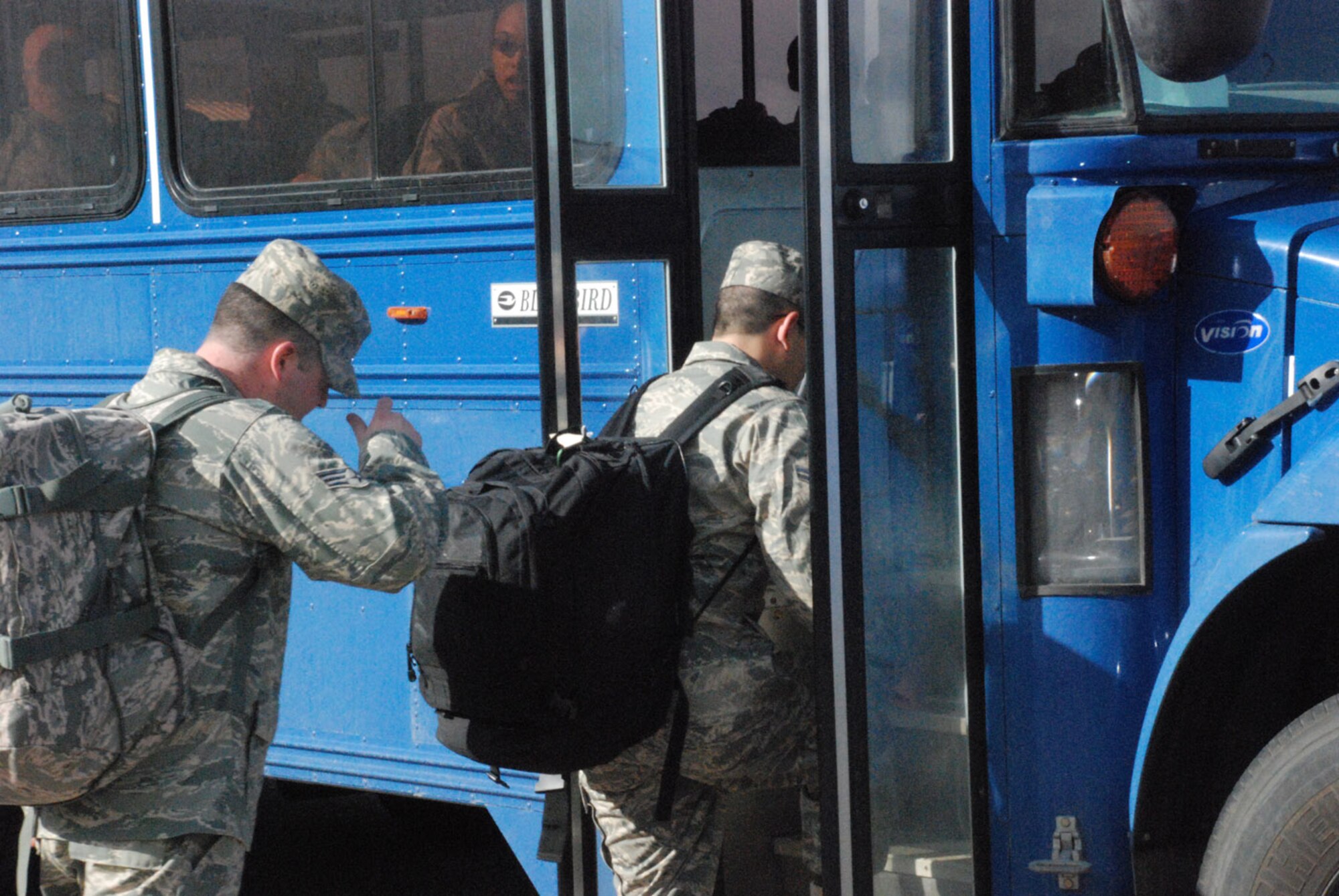 Members from different squadrons at Warren load into a bus Saturday near Bldg. 1284. The people were driven to Cheyenne Regional Airport to begin their deployment (Photo by Airman 1st Class Daryl Knee).