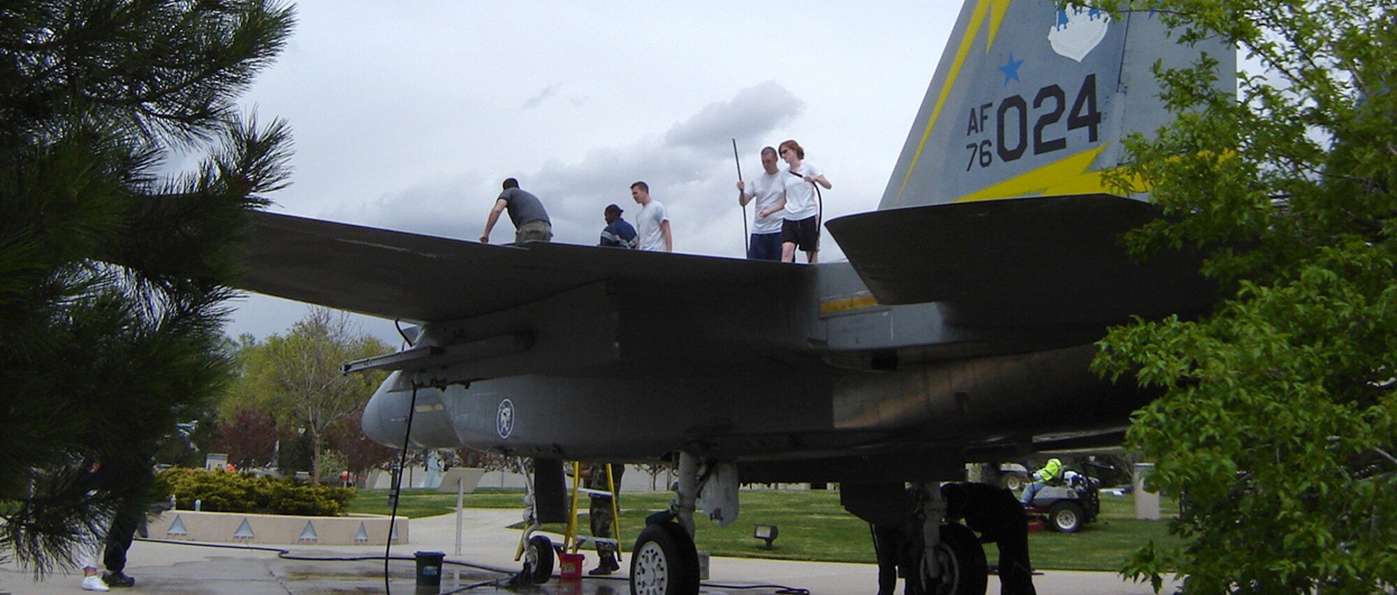 Members of the 21st Aerospace Medicine Squadron begin their second season supporting the Air and Space Museum's "Adopt-A-Plane" program May 14 at Peterson Air Force Base, Colo. The squadron adopted the museum's F-15 "Eagle" in 2007, and assists museum staff in care and maintenance of the aircraft with regular cleanings. Team Peterson organizations interested in adopting a museum aircraft or missile can contact Jeff Nash at 556-8314. (U.S. Air Force photo/Jeff Nash)