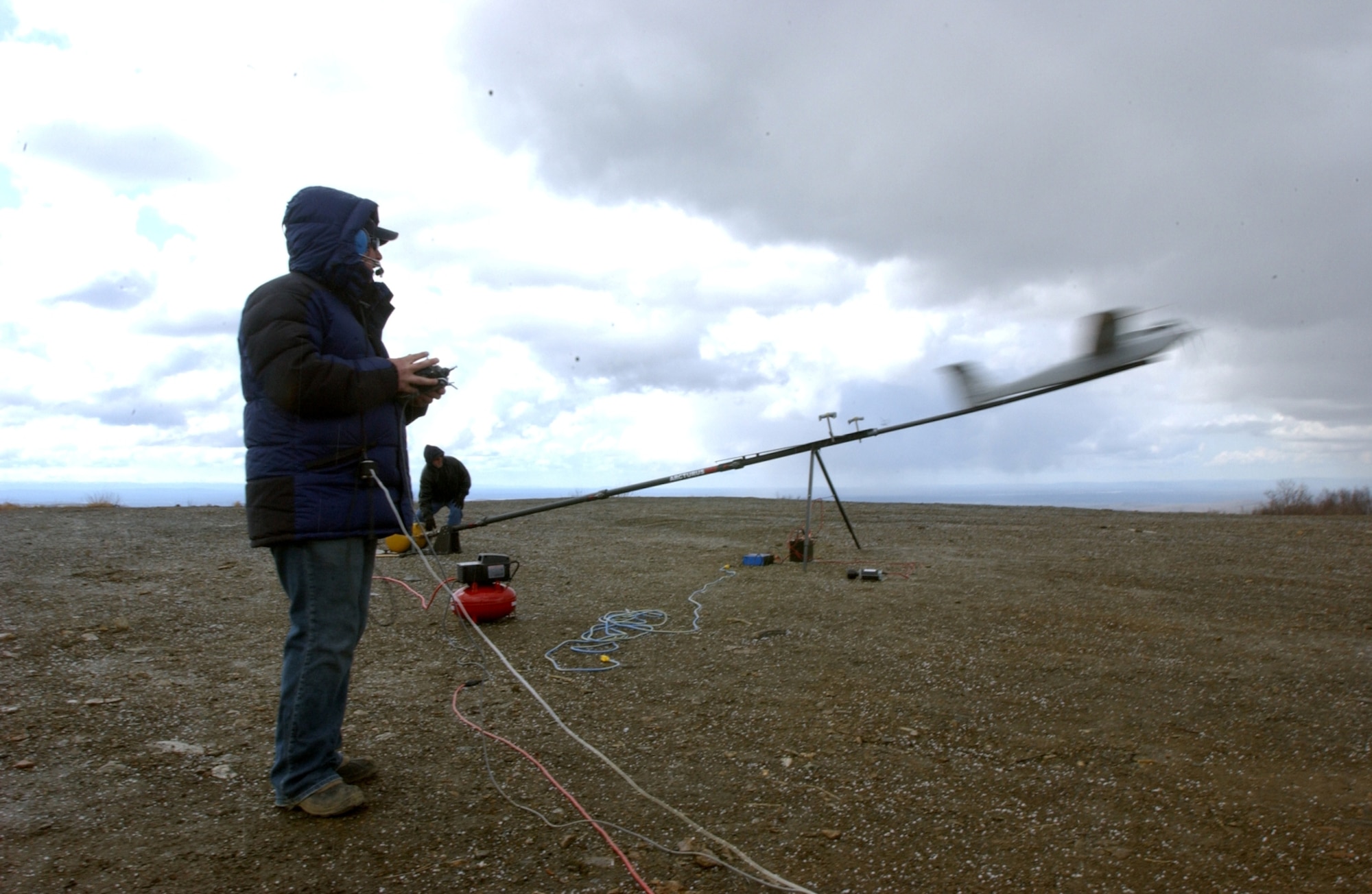 EIELSON AIR FORCE BASE, Alaska – Red Jensen, chief pilot for the Arcturus unmanned aerial vehicle, prepares to launch the prototype UAV during Northern Edge 2008, at a test site in the Pacific Alaska Range Complex. The Arcturus UAV is a brainchild of the Air Force Research Laboratory and is designed for a myriad of aerial reconnaissance, monitoring and communications duties. Photo by Marine Sgt. Rocky Smith