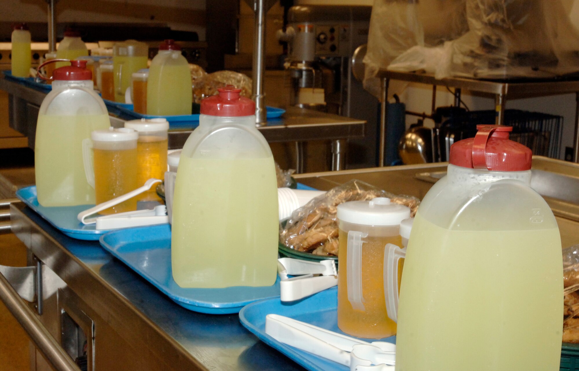 MCCONNELL AIR FORCE BASE, Kan. -- Members of the Child Development Center prepares lemonade, juice, and raisin-oatmeal cookies for an early Mother’s Day Celebration, May 08. The CDC wanted to give mother’s an hour to spend with their children enjoying free cookies and drinks. The children ranged in age from around five months old to toddlers. (Photo by Senior Airman Laura Suttles)