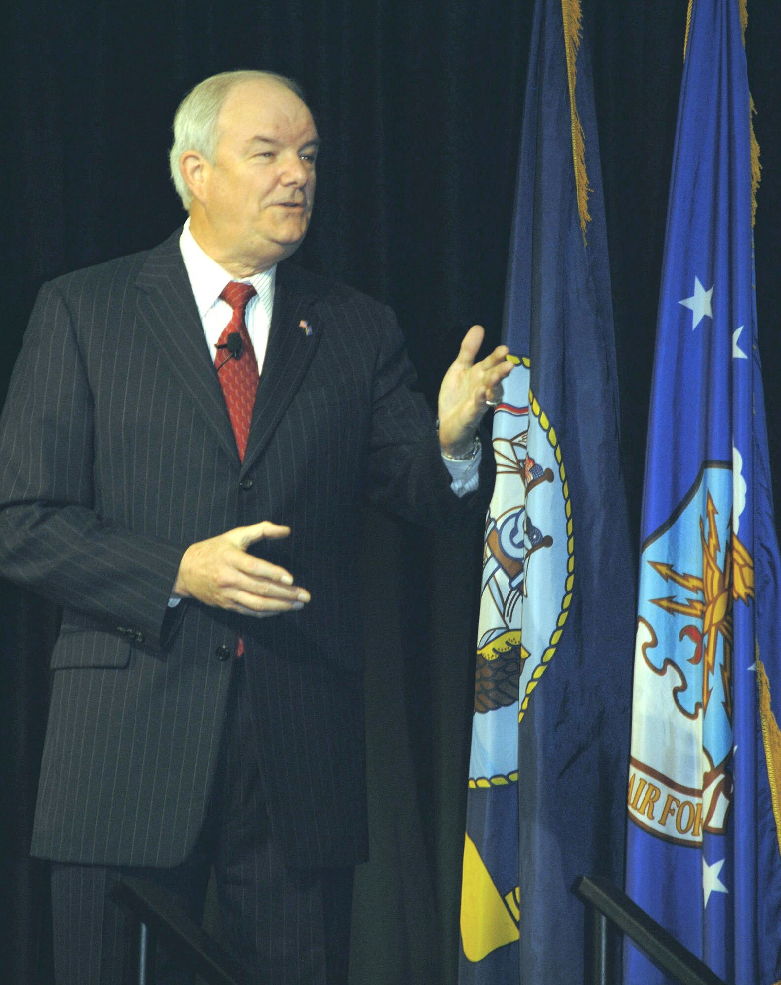 Secretary of the Air Force Michael Wynne addresses Department of Defense military and civilian employees during the 2008 DOD Continuous Process Improvement Symposium May 13 in Lansdowne, Va. The Secretary discussed Air Force Smart Operations for the 21st Century initiatives and reaffirmed the Air Force's committment to improving processes across the service.  (U.S. Air Force photo/Staff Sgt. Monique Randolph)