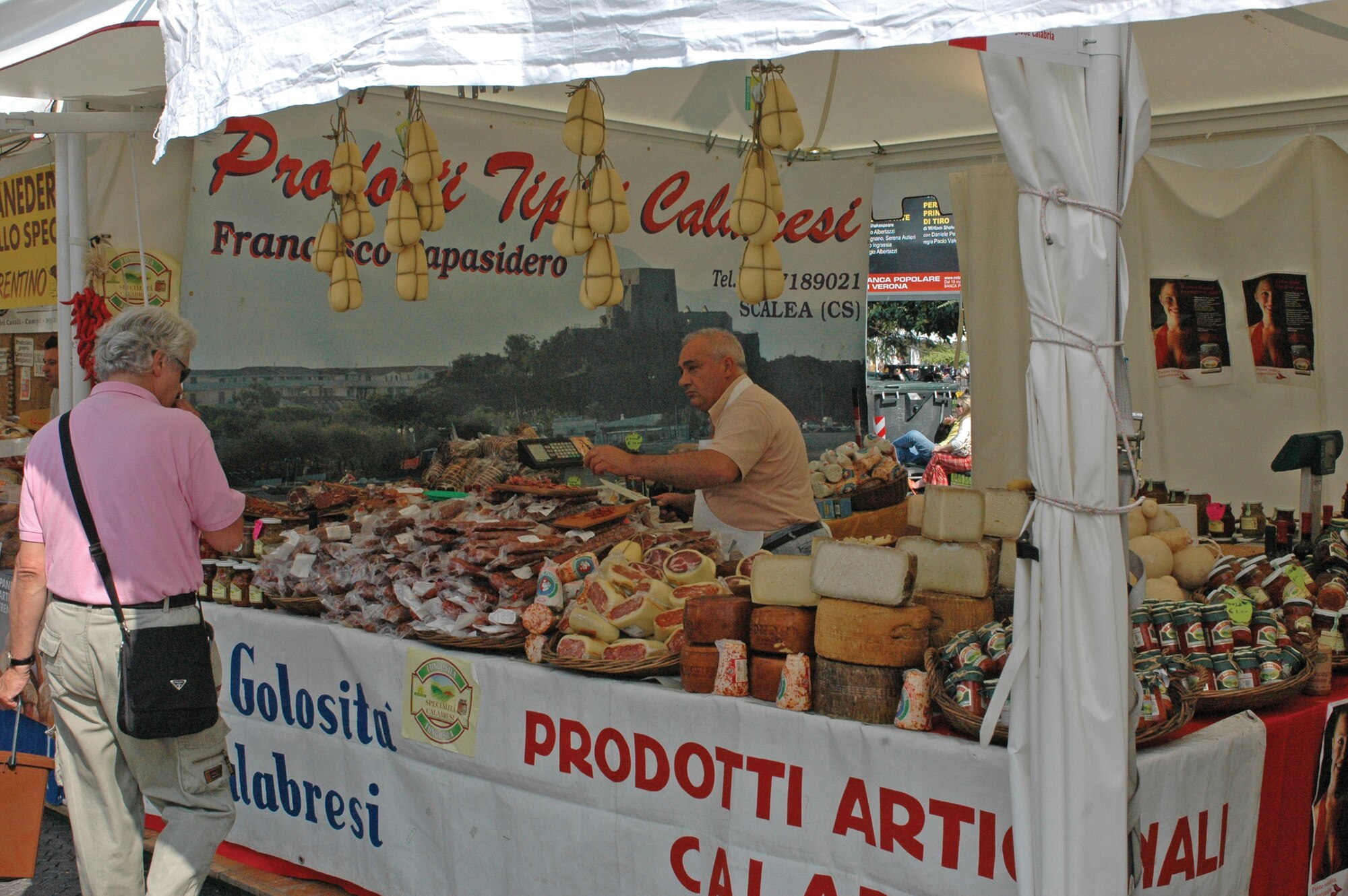 VERONA, Italy--An Italian vendor puts out samples of various meats and sausages along with a variety of cheeses and sauces in the Piazza Square in Verona. (U.S. Air Force photo/Senior Airman Justin Weaver).