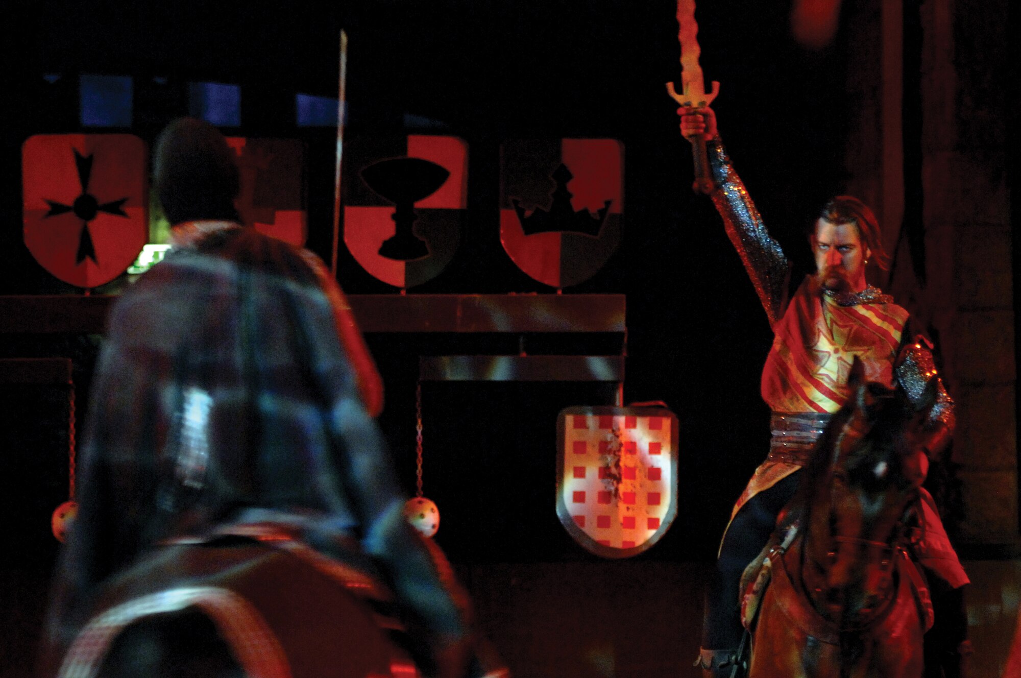 VERONA, Italy --The Red Knight challenges an opponent during a Medieval battle for the heart of the King?s daughter, Princess Esmeralda, May 10. The two-hour long show includes a feast of soup, chicken, bread, strudel.  (U.S. Air Force photo/Staff Sgt. Michael R. Holzworth)