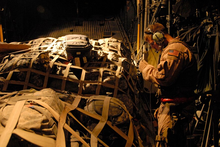 SOUTHWEST ASIA -- Senior Airman Joel Pfaff, an Air Force C-130 Hercules loadmaster with the 737th Expeditionary Airlift Squadron, uses a personal digital assistant to compute the weight and balance of the aircraft prior to take-off from an air base in Iraq on May 13, 2008. Airman Pfaff's job is to ensure the load (cargo and passengers) are balanced correctly in the back of the aircraft. Airman Pfaff is deployed from Dyess Air Force Base, Texas. (U.S. Air Force photo/Tech. Sgt. Michael O'Connor)