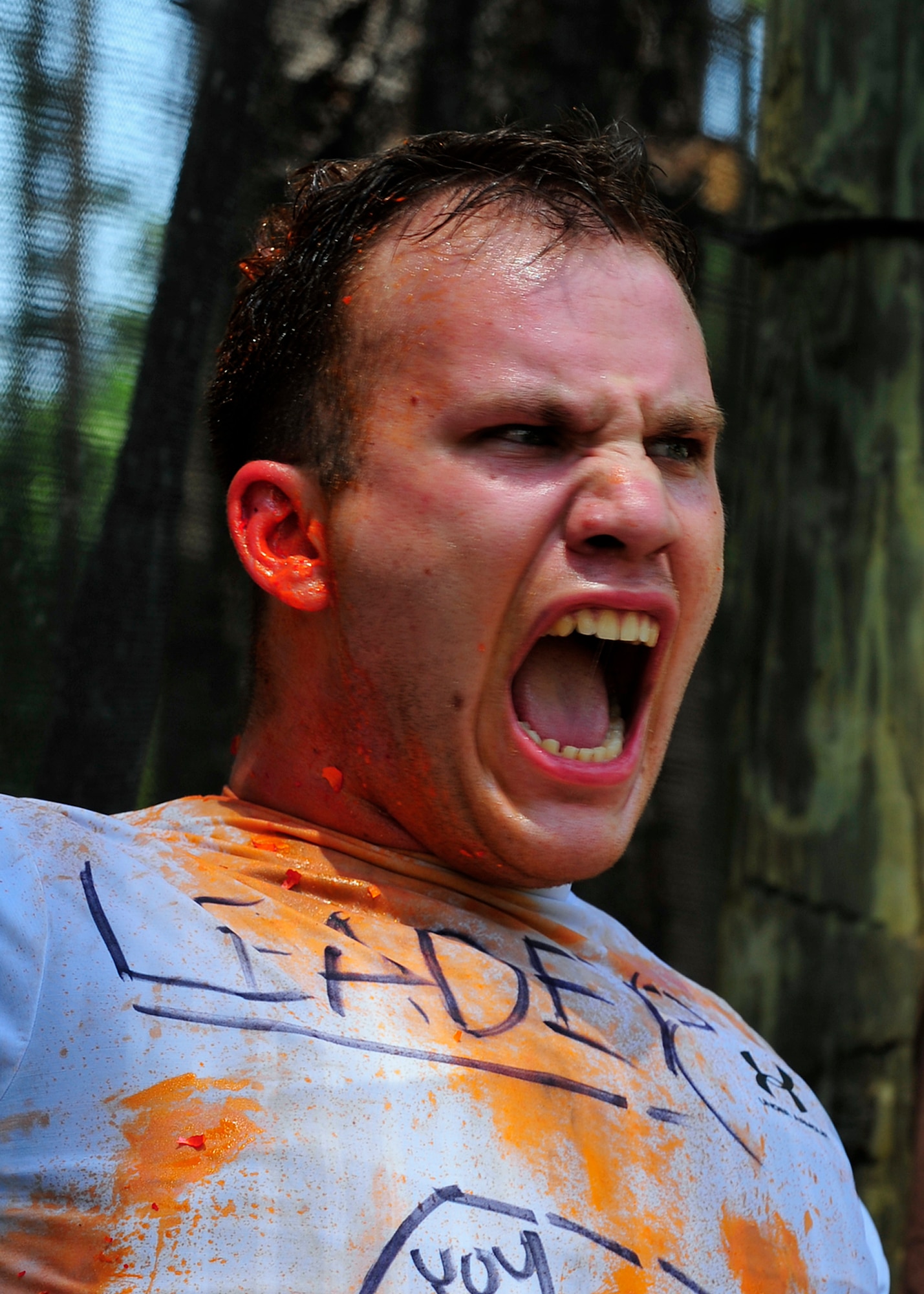 MOODY AIR FORCE  BASE, Ga. -- Airman Jeremiah Carnes, 23rd Security Forces Squadron member, yells after a paintball match here May 14. The 23rd SFS held a paintball tournament at Splatter Swamp paintball range during Police Week. (U.S. Air Force photo by Airman 1st Class Brittany Barker)