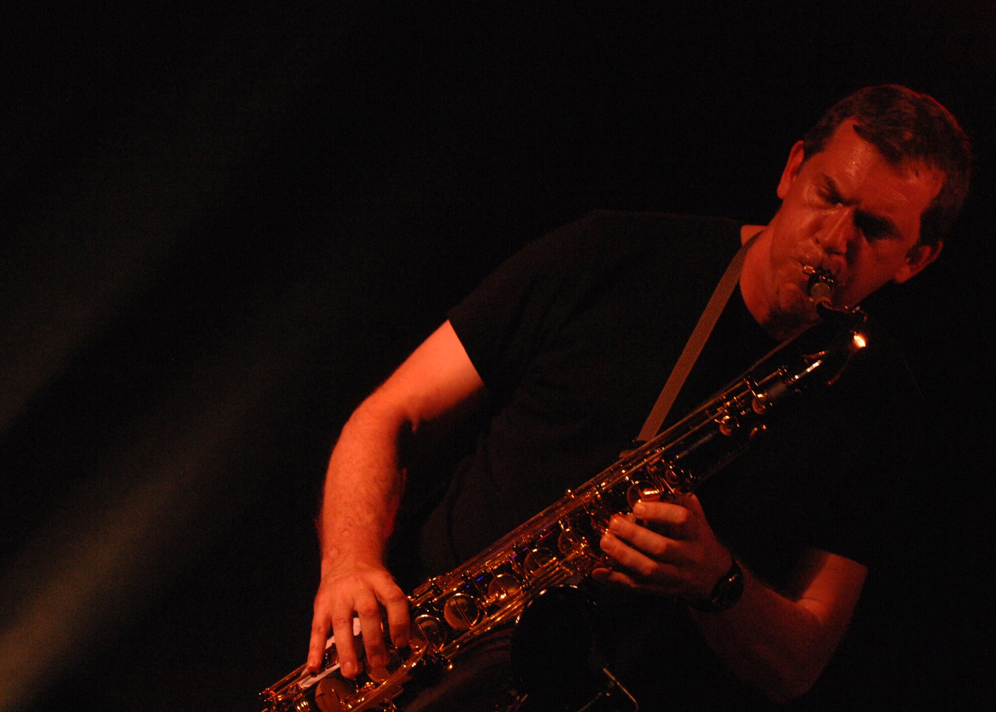 SPANGDAHLEM AIR BASE, Germany-Saxophonist and Keyboardist Craig Shields, of the Edwin McCain Band, play the Tenor Saxophone at the Skelton Memorial Fitness Center May 9, 2008. Mr. Shields entertained the crowd throughout the night with various solos. (U.S. Air Force Photo/Airman 1st Class Jenifer Calhoun)