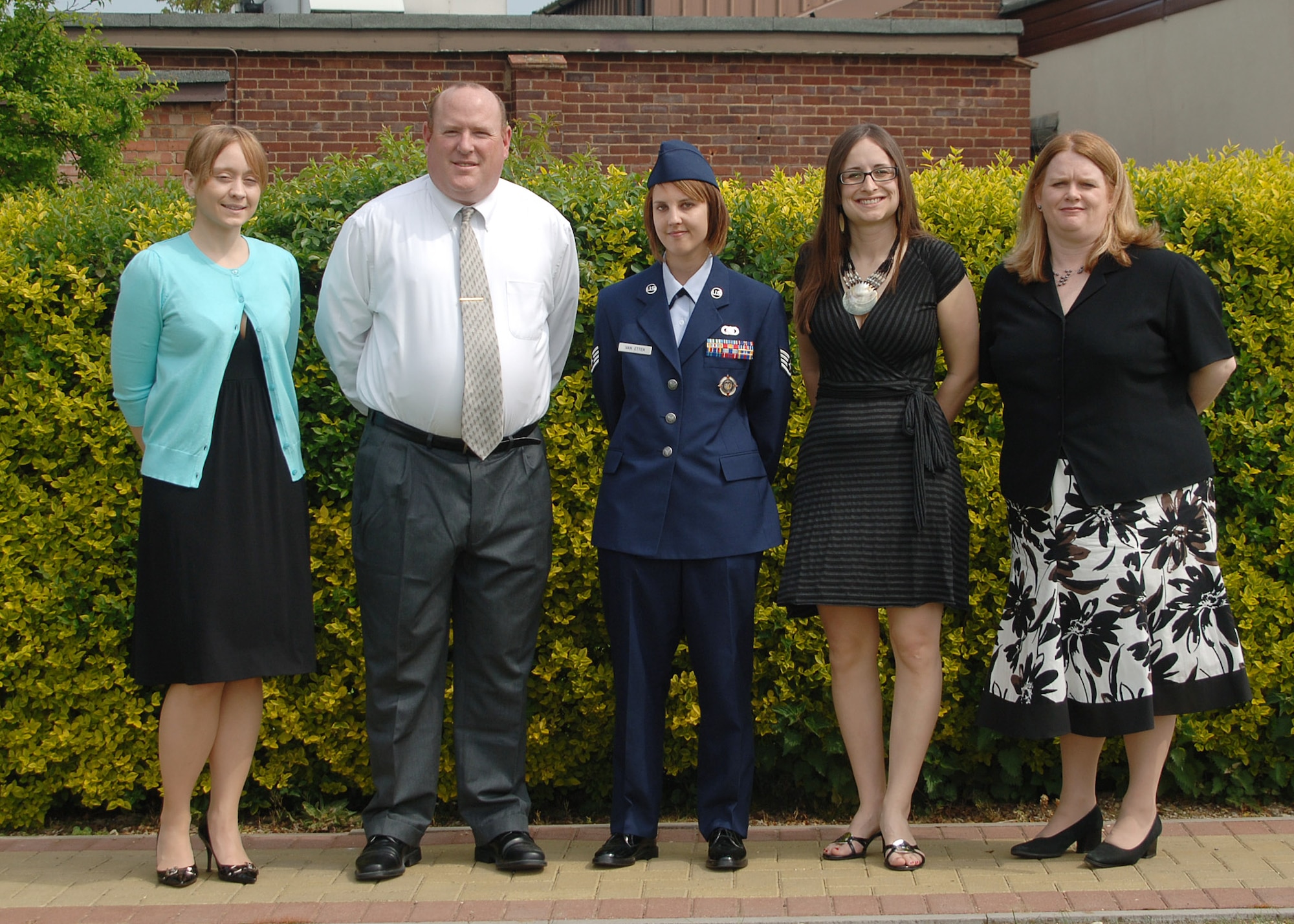 Congratulations to tribase Master Degree recipients (L-R) Ms. Karen Spurgeon (Master of Arts with an emphasis in International Relations), Mr. Terry  Buxton (MBA), Staff Sgt. Leilani Van Etten (Master of Arts with an emphasis in International Relations), Ms. Brianna Huot  (Master of Arts with an emphasis in International Relations), and Mrs. Christina Wilson (Master of Human Relations). (U.S. Air Force Photo by Staff Sgt. Chad E. Chisholm)
 

