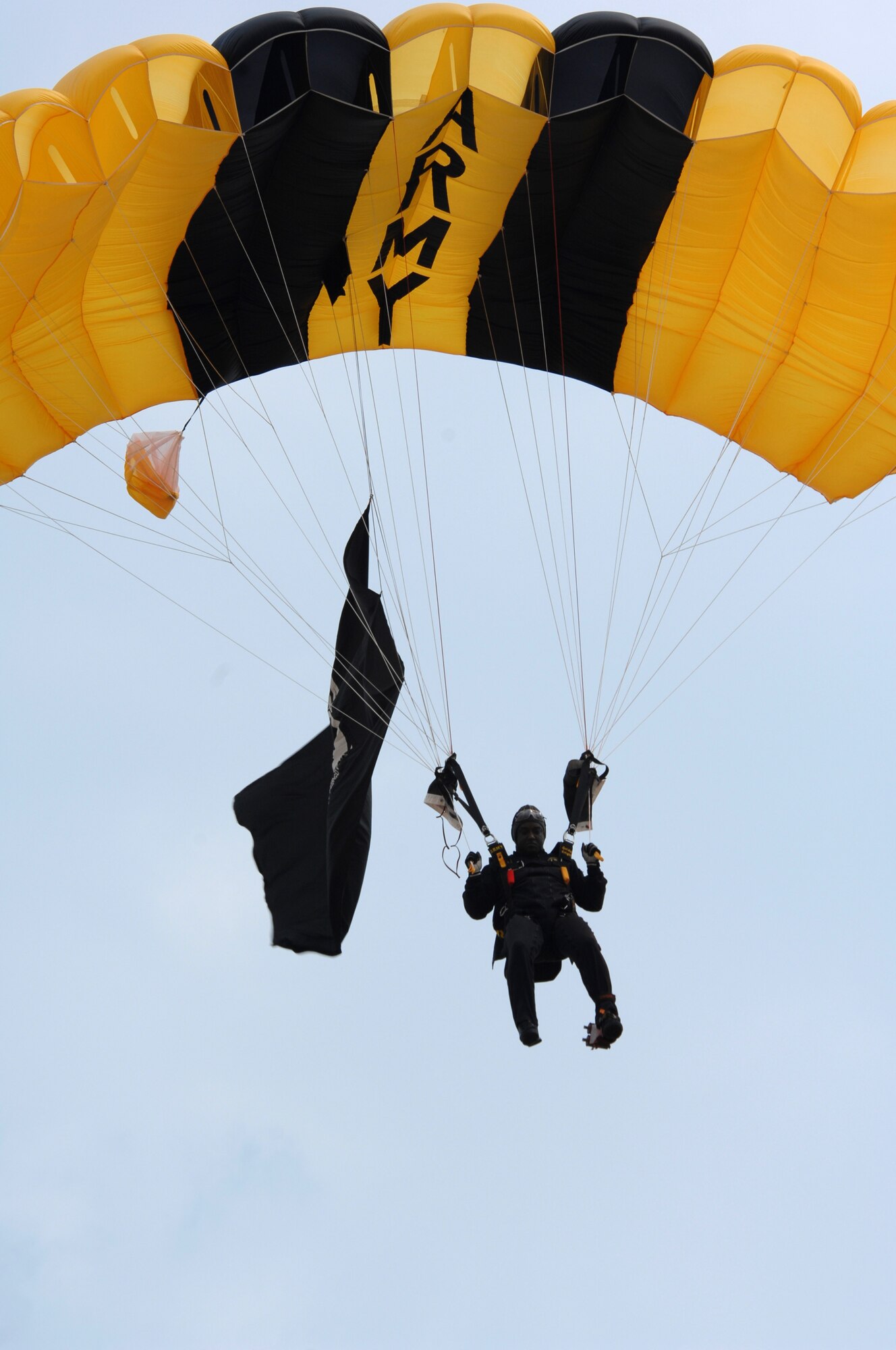 BARKSDALE AIR FORCE BASE, La. -- U.S. Army Staff Sgt. Howie Sanborn, Golden Knight Parachutist, escorts the U.S. Flag to the Barksdale Air Force Base flight line during the opening ceremony of the Barksdale Air Force Base 2008 Defenders of Liberty Air Show.  The Air Show commemorates the 75th anniversary of Barksdale Air Force Base.  (U.S. Air Force photo by TSgt Laura K. Smith)