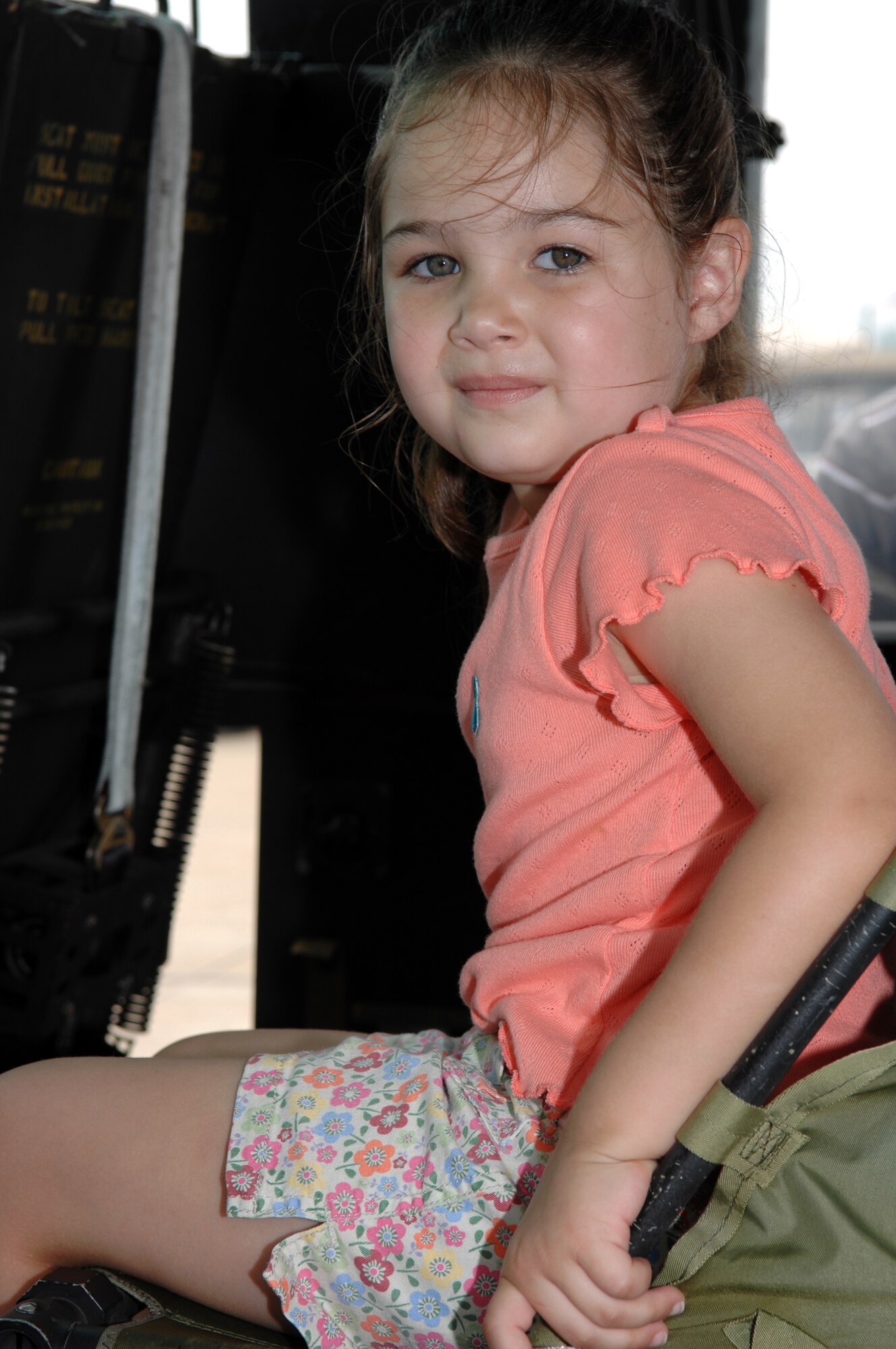 BARKSDALE AIR FORCE BASE, La. -- Zoe Garcia, 5, sits in the cockpit of a U.S. Air Force UH-1 Huey helicopter on the flight line of Barksdale Air Force Base, La. during the 2008 Defenders of Liberty Air Show.  The Air Show commemorates the 75th anniversary of Barksdale Air Force Base.  (U.S. Air Force photo by TSgt Laura K. Smith)