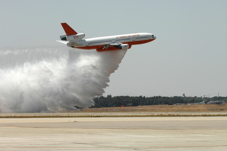 A California Department of Forestry specially equipped DC-10 demonstrates a water drop at the March Air Reserve Base AirFest '08, Riverside, California.  The two day event featured both military and civilian aerial and ground demonstrations and was open to the public. (U.S. Air Force photo by SSgt John Herrick) 