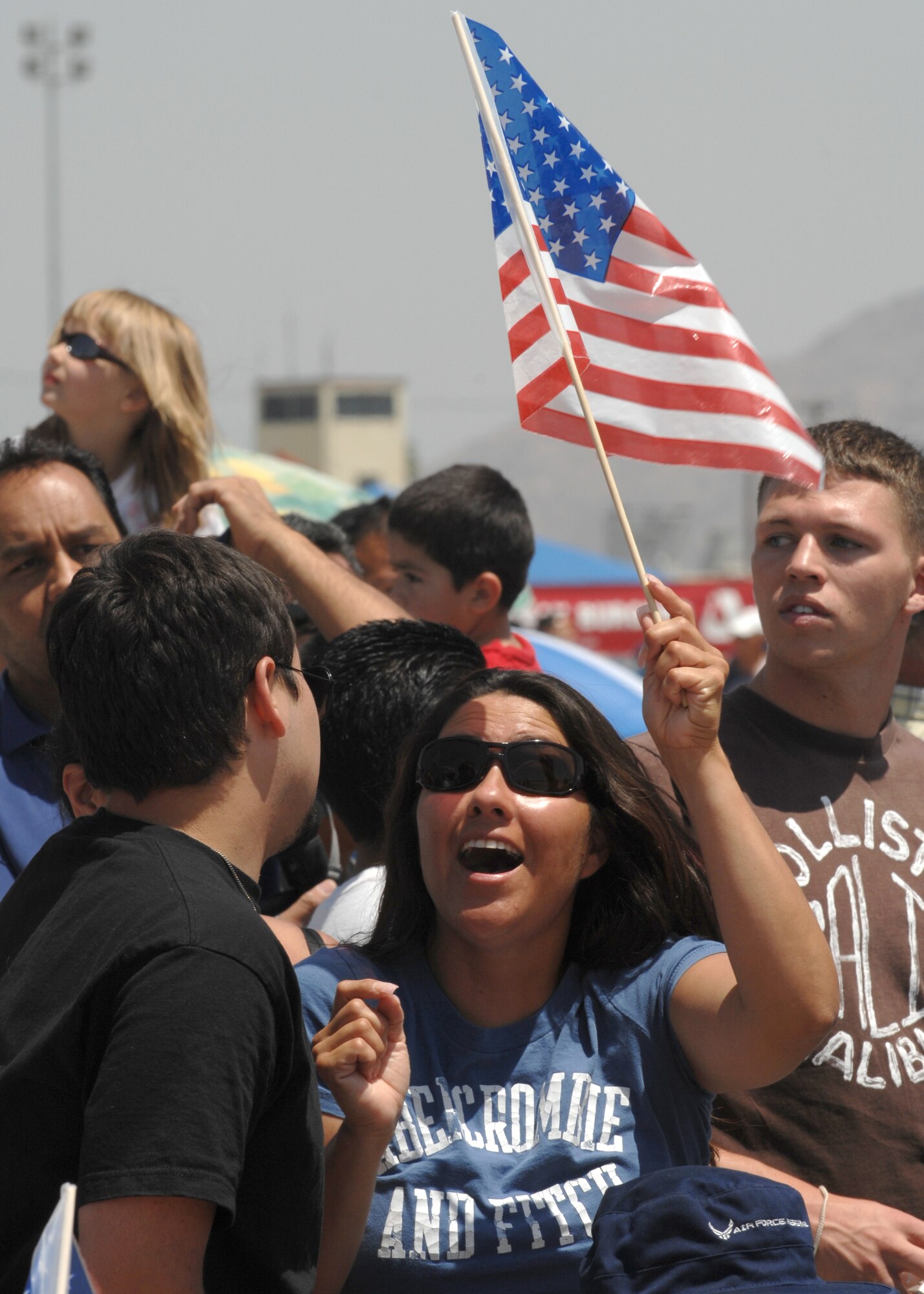 Patriotic spectators enjoy the view at the March Air Reserve Base AirFest '08, Riverside, California on May 3, 2008.  The two day event featured both military and civilian aerial and ground demonstrations and was open to the public. (U.S. Air Force photo by SSgt John Herrick)