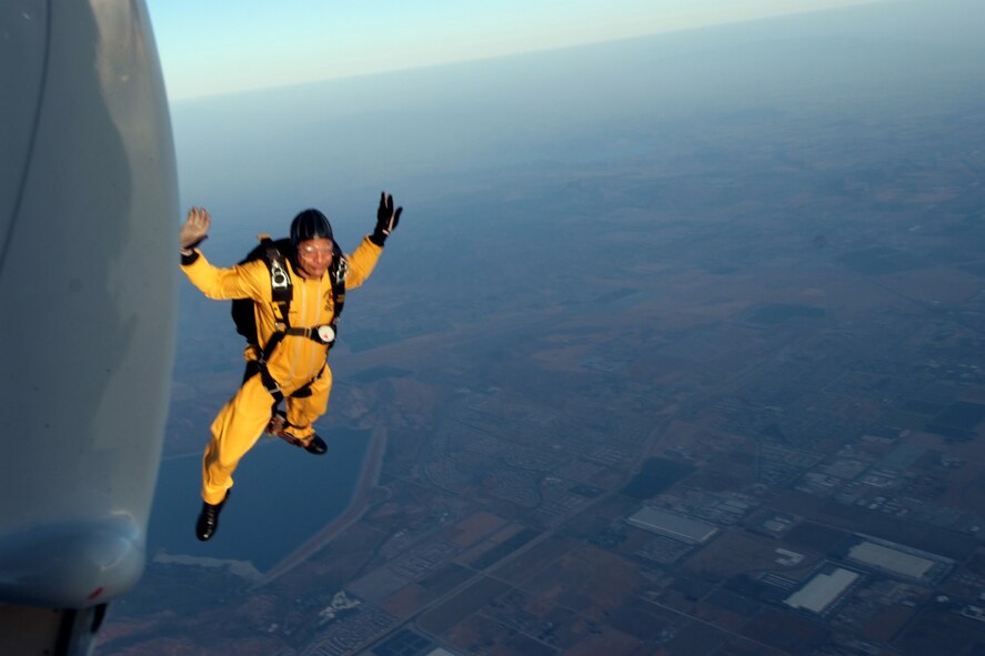 A member of the U.S. Army Golden Knights Parachute Team jumps out of a C-31 Fokker during the air show at March Air Reserve Base.  Dubbed "Thunder over the Empire", the  biannual air show allows the civilian community the chance to interact with the military community.  (U.S. Air Force photo by TSgt Joe Zuccaro) 