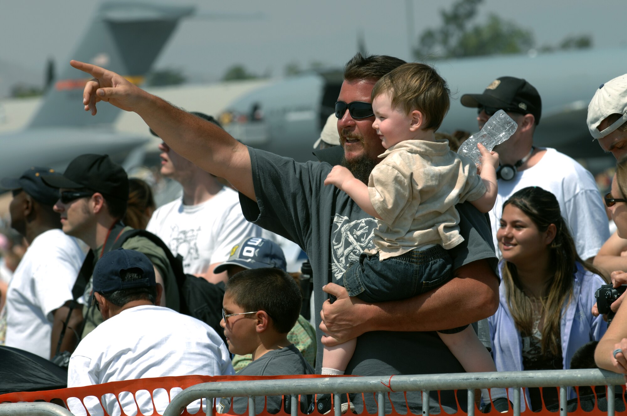 Spectators enjoy the show at the March Air Reserve Base AirFest '08, Riverside, California on May 3, 2008.  The two day event featured both military and civilian aerial and ground demonstrations and was open to the public. (U.S. Air Force photo by SSgt John Herrick)