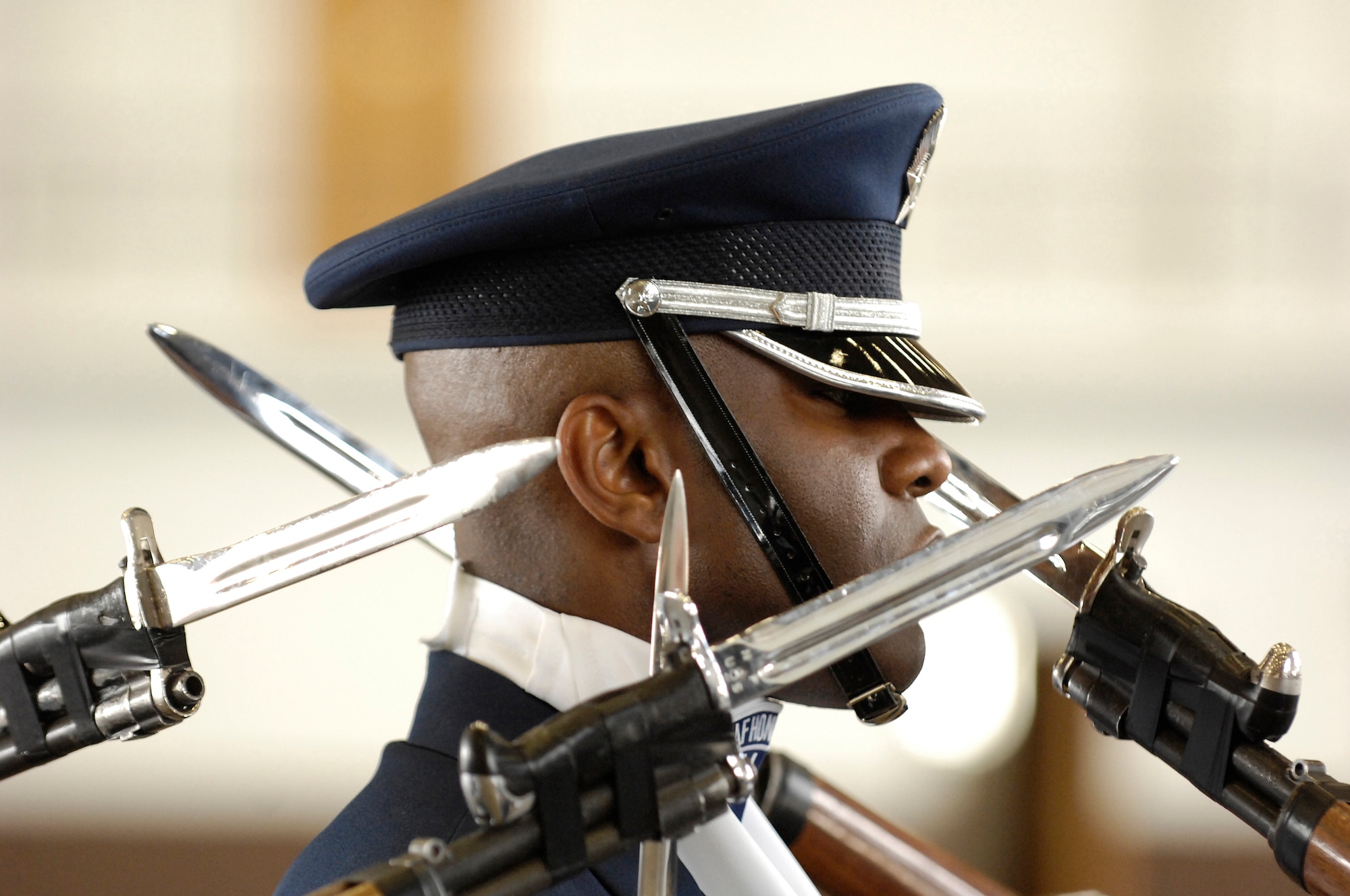 Master Sgt. Steven West, Drill Team Superintendent, stands in the center of the 4-man team during a performance at Ellsworth AFB. The AF Honor Guard Drill Team is the traveling component of the AF Honor Guard and tours world-wide representing all Airmen and showcasing USAF precision to recruit, retain, and inspire for the Air Force mission. (U.S. Air Force photo by Senior Airman Dan DeCook)(Released)