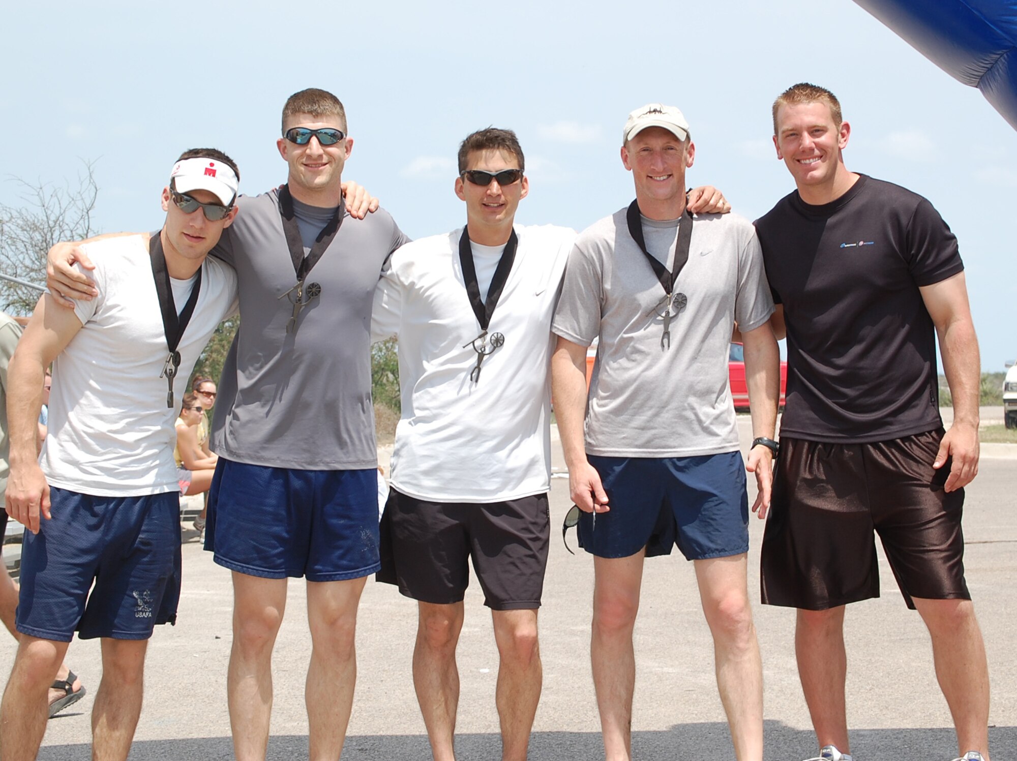 Warbird competitors 2nd Lt. Jondavid Hertzel, Capt. Nathan Thompson, Maj. Brian Gienapp, Maj. William Browne and equipment manager 1st Lt. Brent Tittle (right) finished thrid in the 'extreme' category and eighth of 66 teams in the 36-mile fourth annual Adventure Race held at Laughlin Air Force Base, Texas. (Courtesy photo) 