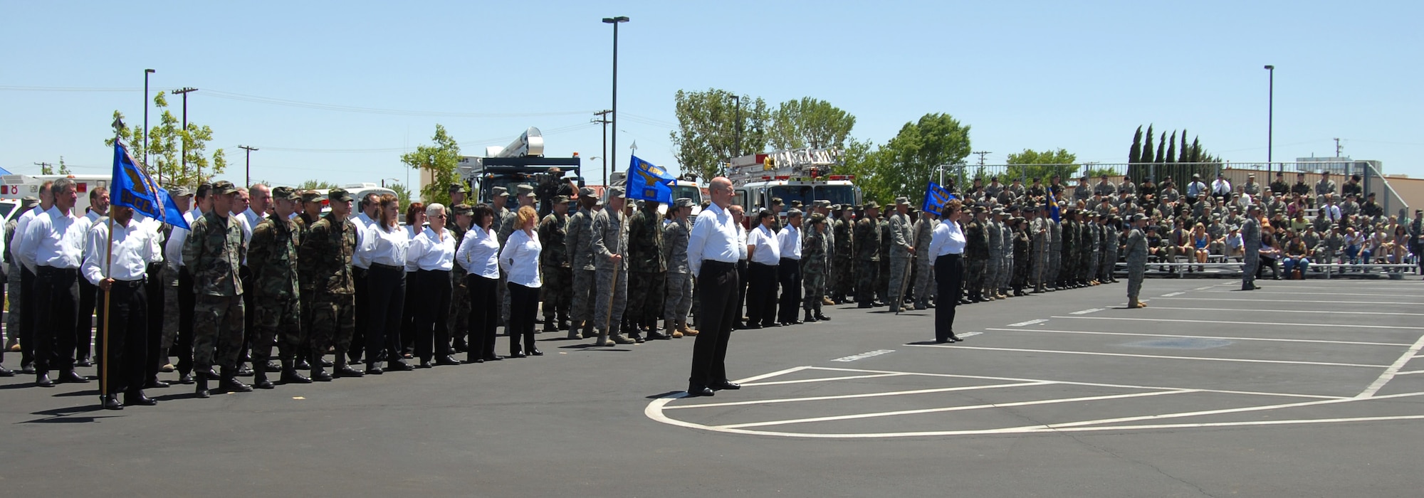 95th Air Base Wing personnel stand at parade rest during the wing's appointment to command ceremony for Col. Jerry Gandy at the building 3000 parking lot here May 16. As the 95th ABW commander and Edwards installation commander, Colonel Gandy is responsible for base operations that includes infrastructure, communication systems, security, medical services, fire protection, transportation, supply, finance, contracting, legal services, personnel and manpower support as well as housing, education, chapel and quality-of-life programs. (Air Force photo by Senior Airman Julius Delos Reyes)