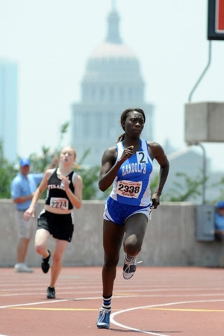 Randolph?s Jayla McArthur sprints to a first-place finish in the 400-meter run Saturday at the Class 2A state track and field meet. In her three years competing at state, McArthur totaled 11 medals, eight of them gold. (Photo by John Albright)
