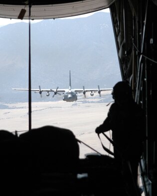 The 731st Airlift Squadron trains over the Colorado Front Range during the 302nd Airlift Wing's May Unit Training Assembly. Reservists of the 731st AS continually enhance their skills in order to remain mission ready. (Air Force Photo/ Capt. Jody L. Ritchie)