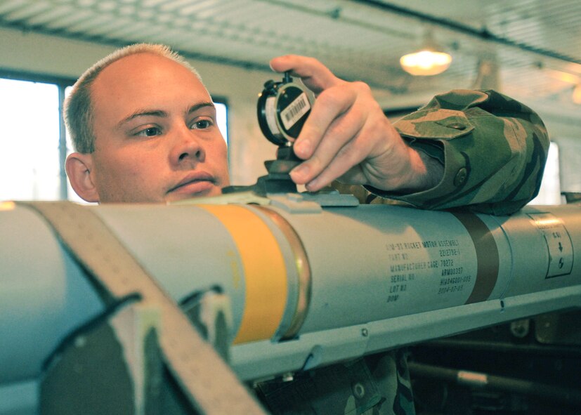 Staff Sgt. Wayne Zuiderhof checks the depth value on the forward hanger of a weapon May 14 at Elmendorf Air Force Base, Alaska. Sergeant Zuiderhof, assigned to the 3rd Equipment Maintenance Squadron Munitions Flight, was one of two recipients of the 2007 AIM-9X Cutting Edge Award. (U.S. Air Force photo/ Airman 1st Class Laura Turner) 