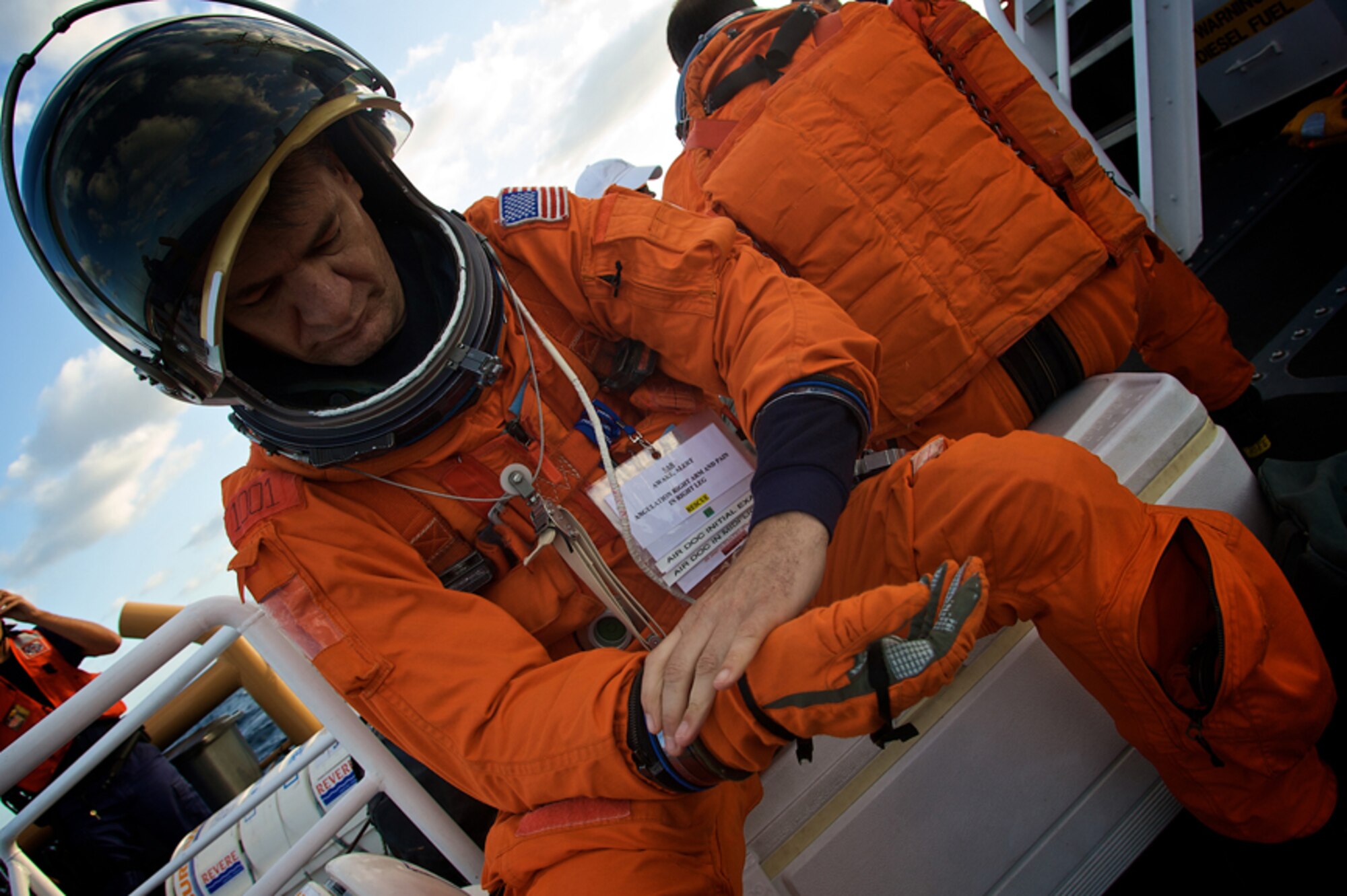 PATRICK AIR FORCE BASE, Fla.--  NASA astronaut Paolo Angelo Nespoli secures his gloves May 14, 2008 just before dropping into the chilly waters of Atlantic Ocean two miles off Florida's east coast.  Air Force Reserve pararescuemen from the 920th Rescue Wing quickly located Nespoli and hoisted him into their rescue helicopter during this annual training exercise.  Members of the 920th RQW are part of a joint task force that supports Space Shuttle launches and are always ready in the event of an emergency. (U.S. Air Force photo/Tech. Sgt. Jeremy Allen)