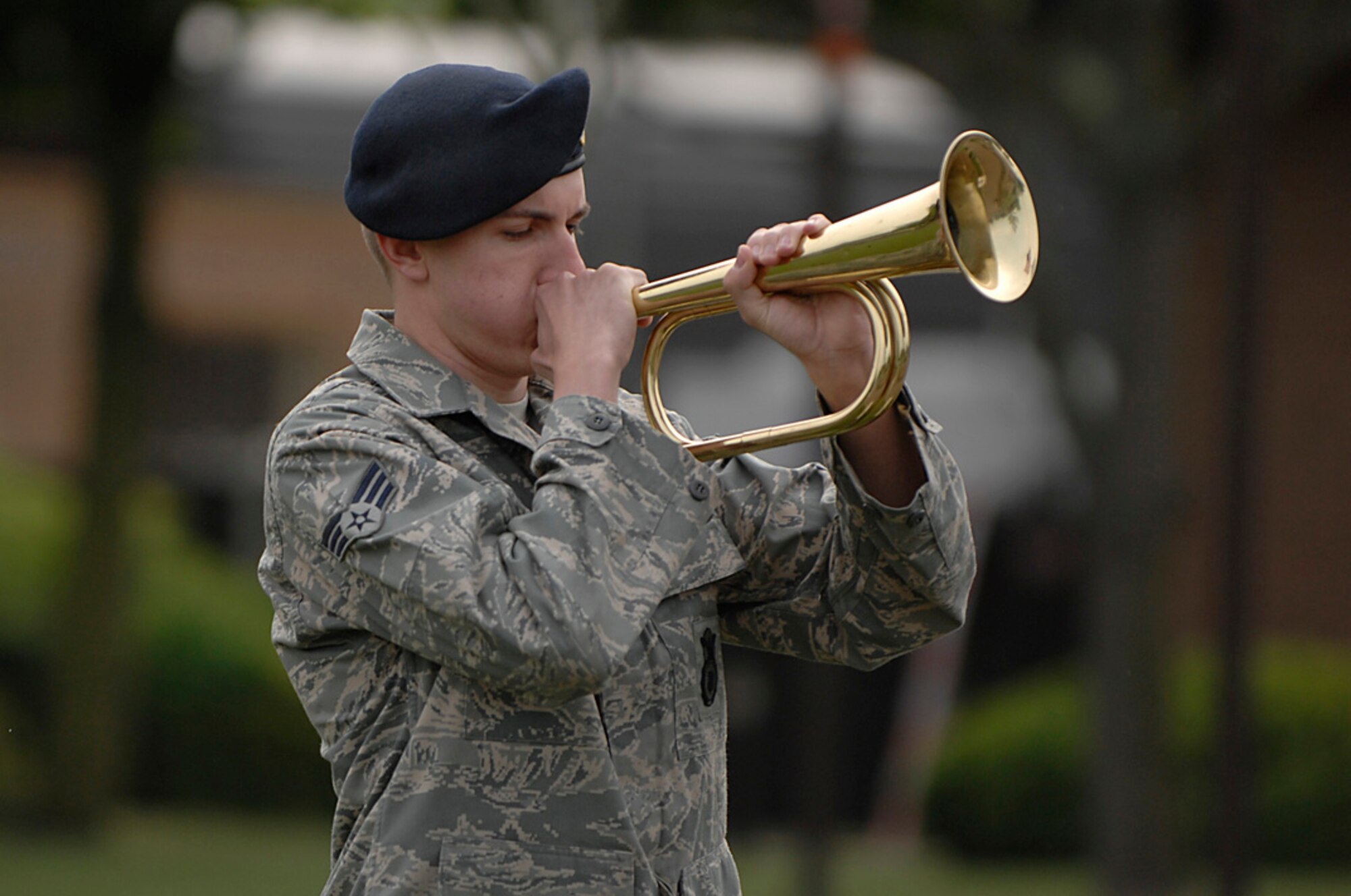 Senior Airman Albert Seidenstucker, 48th Security Forces Squadron, performs “Taps” during a retreat ceremony on National Peace Officer Remembrance Day during Police Week at RAF Lakenheath, May 15. During the annual National Police Week law enforcement honors their fallen officers and ensures everyone is aware of their duties and sacrifices. This year had a special meaning for the 48 SFS as they honored one of their own, Senior Airman Jason D. Nathan was lost while on combat patrol in Tikrit, Iraq on June 23, 2007. (U.S. Air Force photo by Senior Airman Brian J. Ellis)