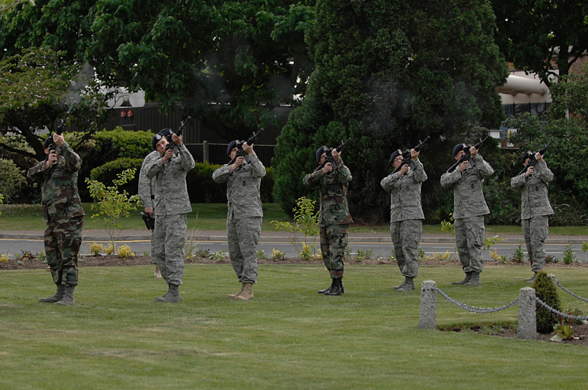 Members of the 48th Security Forces Squadron render a 21-gun salute during a retreat ceremony on National Peace Officer Remembrance Day during Police Week at RAF Lakenheath, May 15. During the annual National Police Week law enforcement honors their fallen officers and ensures everyone is aware of their duties and sacrifices. This year had a special meaning for the 48 SFS as they honored one of their own, Senior Airman Jason D. Nathan was lost while on combat patrol in Tikrit, Iraq on June 23, 2007. (U.S. Air Force photo by Senior Airman Brian J. Ellis)
