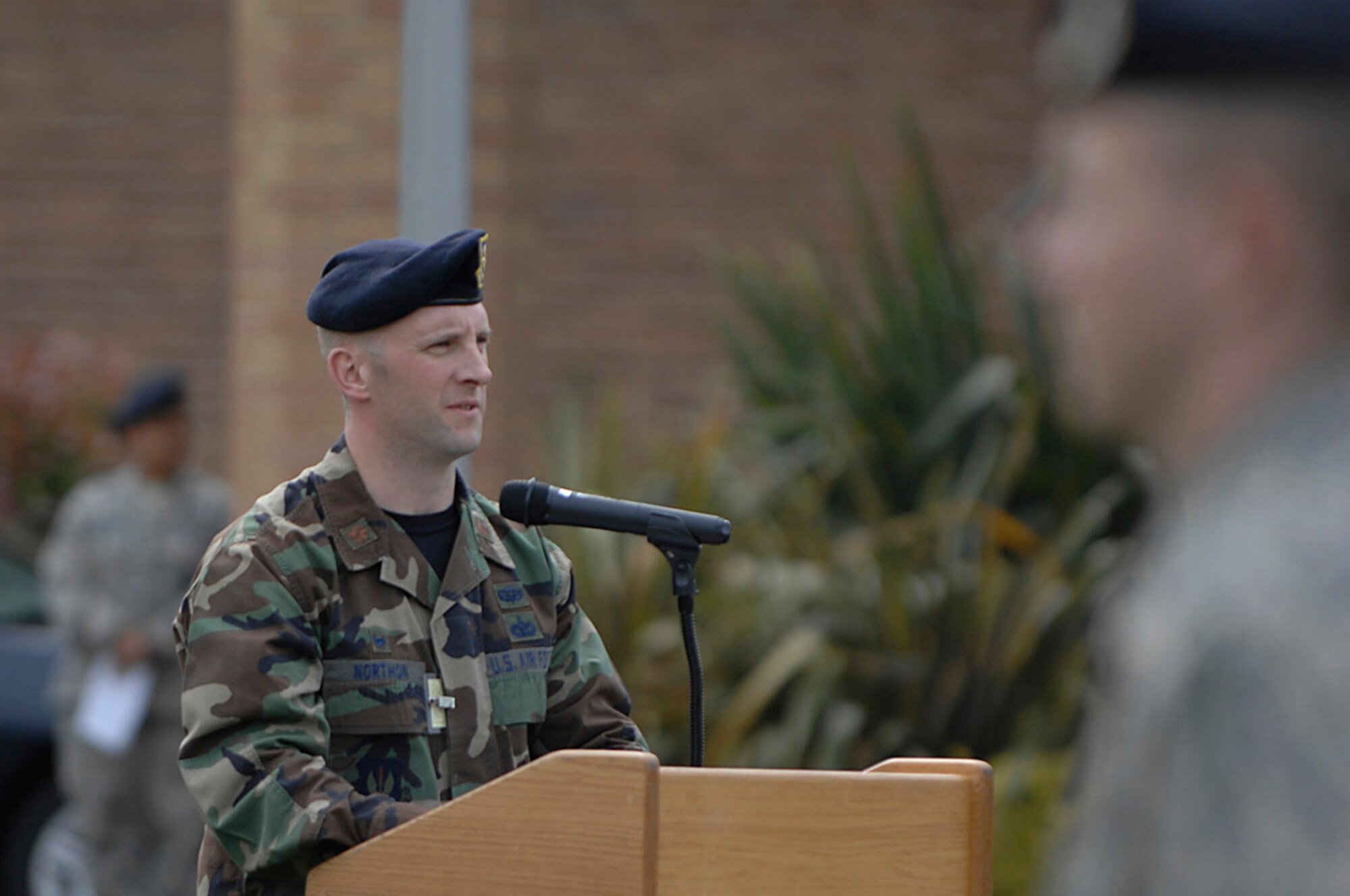 Major John Northon, 48th Security Forces Squadron commander, speaks at a retreat ceremony on National Peace Officer Remembrance Day during Police Week at RAF Lakenheath, May 15. During the annual National Police Week law enforcement honors their fallen officers and ensures everyone is aware of their duties and sacrifices. This year had a special meaning for the 48 SFS as they honored one of their own, Senior Airman Jason D. Nathan was lost while on combat patrol in Tikrit, Iraq on June 23, 2007. (U.S. Air Force photo by Senior Airman Brian J. Ellis)