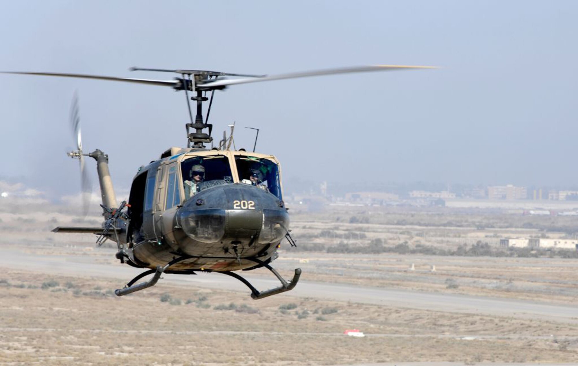 An Iraqi air crew flies an Iraqi air force Huey II  in support of ground operations in Mosul. The IqAF has increased its role during three missions to include Mosul, Sadr City and Bosrah. (file photo)