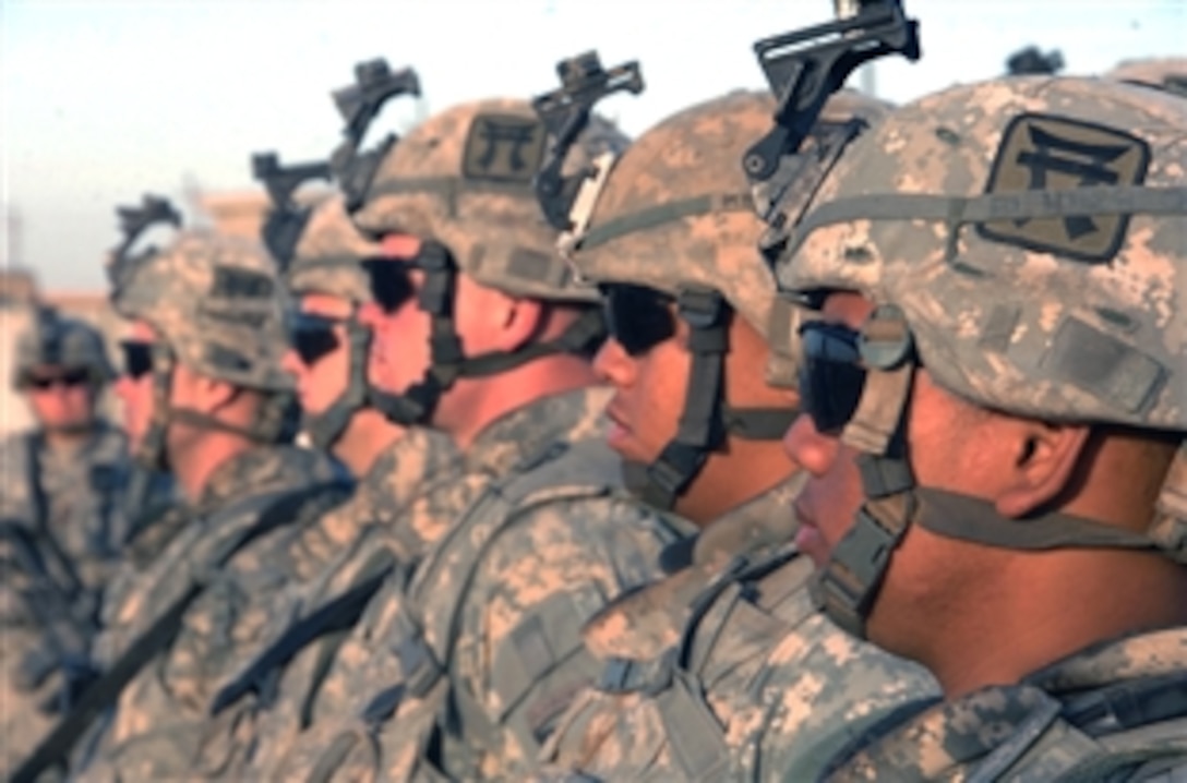 U.S. soldiers assigned to the 101st Airborne Division, 3rd Brigade Combat Team, stand in formation and wait for further orders before an air assault mission on May 11th, 2008. 