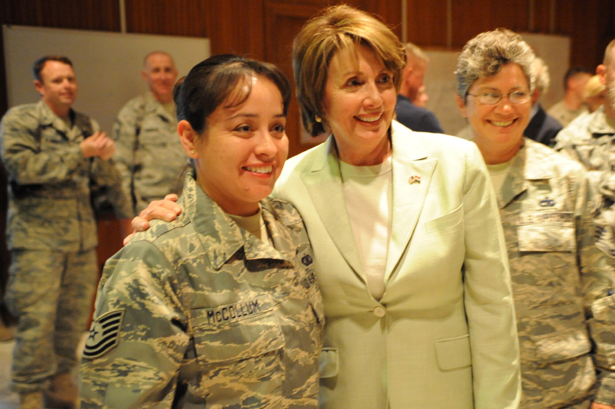 SATHER AIR BASE, Iraq -- Tech. Sgt. Dilphia McCollum, 447th Air Expeditionary Group, stands with the Speaker of the House, Nancy Pelosi, during the speaker's visit with deployed Airmen and Soldiers here May 17. Ms. Pelosi visited the base with seven other U.S. Representatives. (U.S. Air Force photo/Tech. Sgt. Amanda Callahan) 