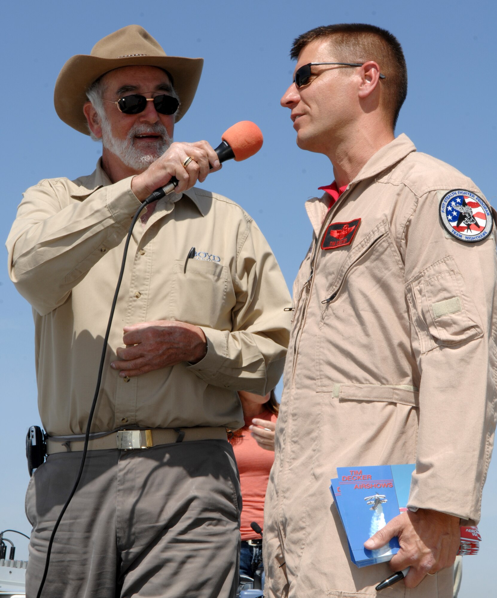 Air Force Major Tim Decker is interviewed after his aerial demonstration performance at the March Air Reserve Base AirFest '08.  The two day event featured both military and civilian aerial and ground demonstrations and was open to the public. (U.S. Air Force photo by SSgt John Herrick)