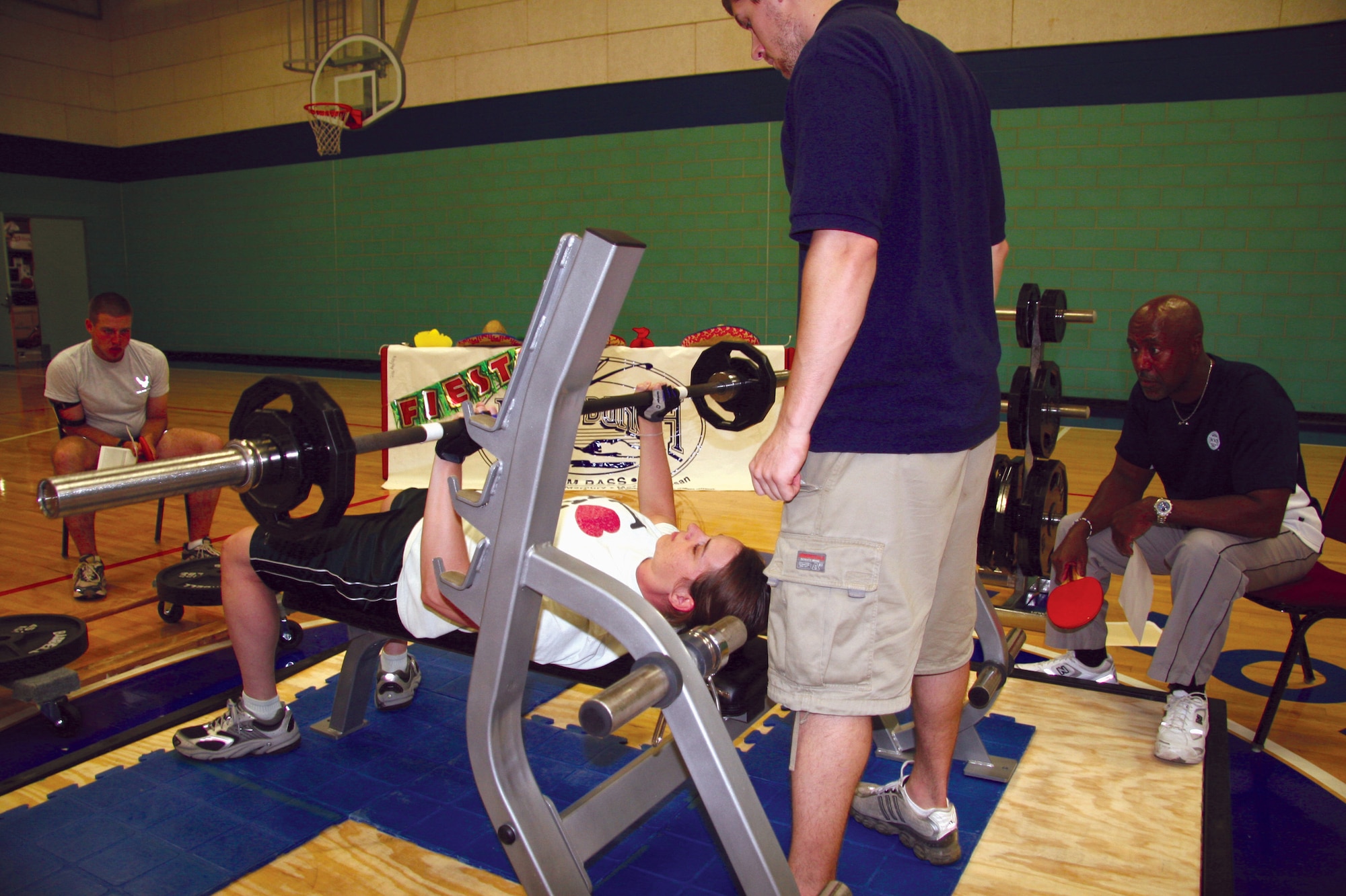 Elycia Fine, female heavy weight class 1st place winner, lifts during the competition May 5. (U.S. Air Force photo by Julie Manuel)