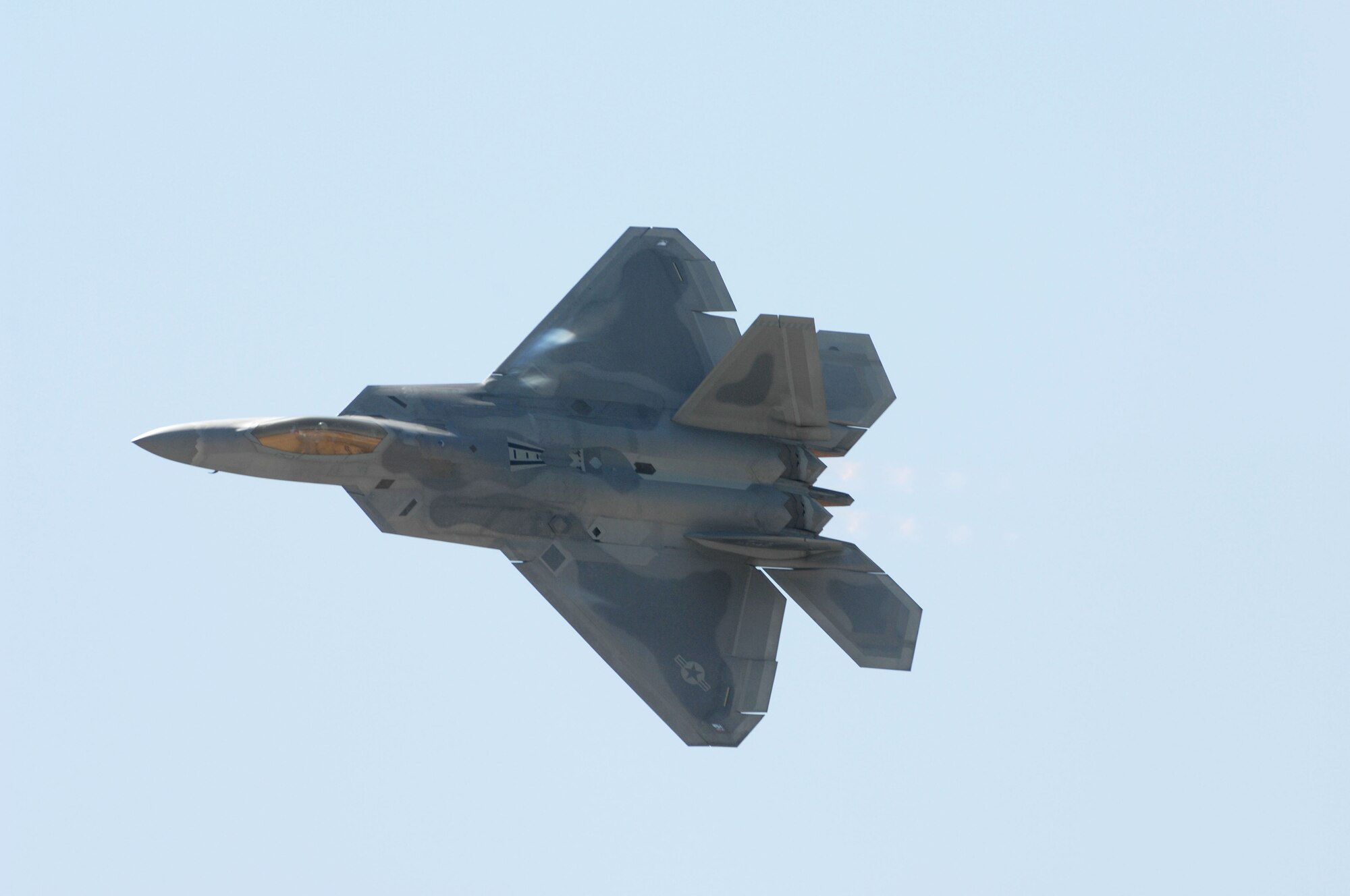 An F-22 Raptor demonstrates its aerial maneuverability at March Air Reserve Base, California during Air Fest '08 on May 3.  AirFest '08 featured both military and civilian aerial and ground demonstrations during the two day air show. (U.S. Air Force photo by Airman 1st Class Jimmy Dang)