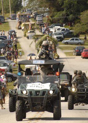 As part of the Air Force’s local Sister Village Program, Andersen Airmen from the 36th Security Forces Squadron participated in the annual Malojloj Fiesta in Inarajan May 17. (U.S. Air Force photo by Staff Sgt. Patrick Mitchell)
