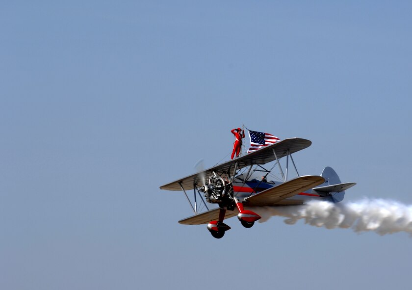 Margaret Stivers of the Silvers Wings salutes the crowd from a Stearman Biplane.  AirFest '08 featured both military and civilian aerial and ground demonstrations during the two day air show, May 3-4, 2008 at March Air Reserve Base, Riverside, California. (U.S. Air Force photo by SrA Matthew Smith)