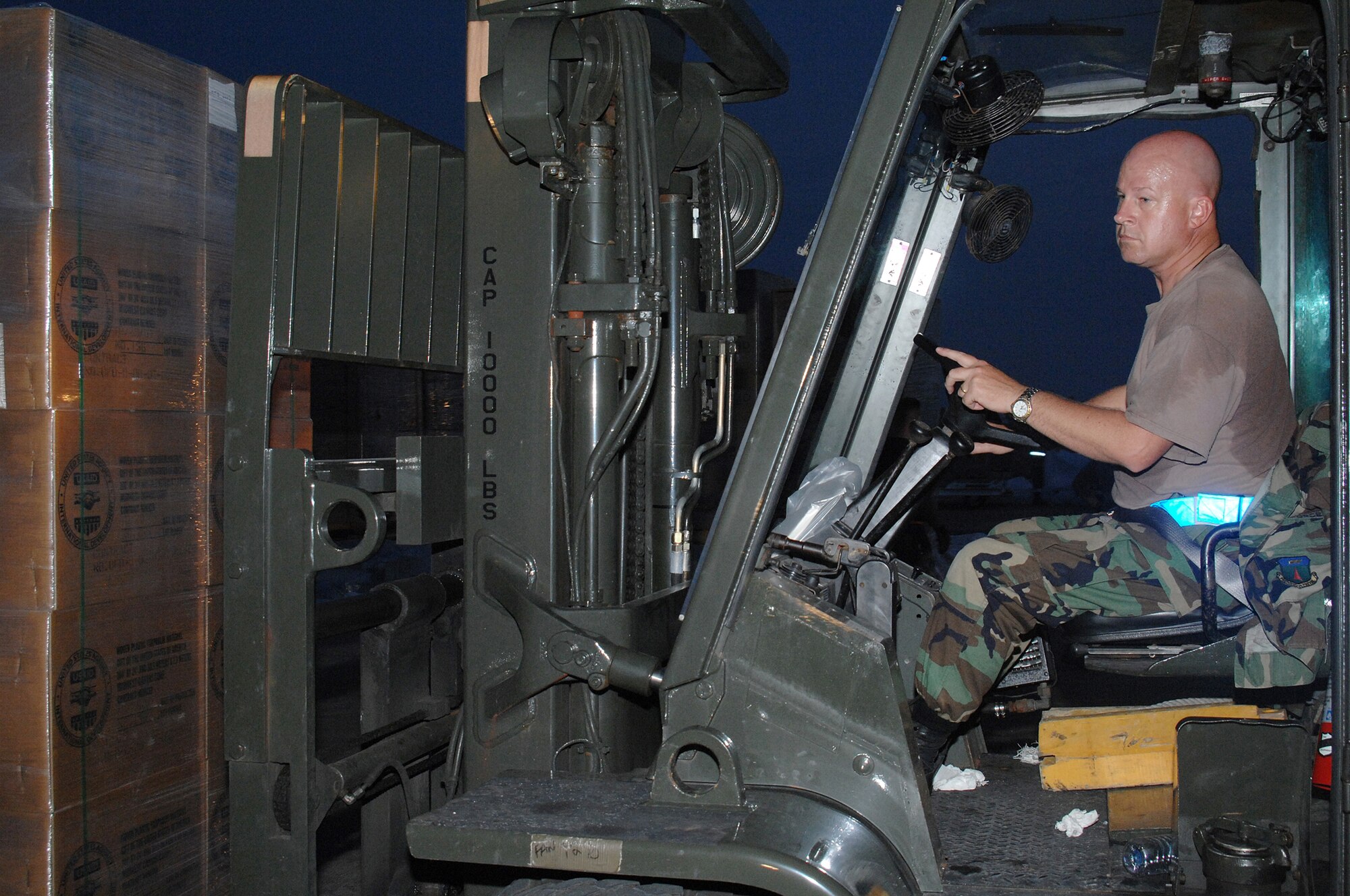 Utapao, Thailand - Master Sgt James Werner, 36th Mobility Response Squadron, operates a forklift during the downloading of humanitarian relief supplies from a Boeing 747 commercial airplane for delivery into Burma May 16. MSgt Werner is one of 45 members forward deployed from Andersen AFB, Guam trained and prepared to respond quickly to disasters such as Cyclone Nargis. (USAF photo/Senior Airman Sonya Croston)(RELEASED)