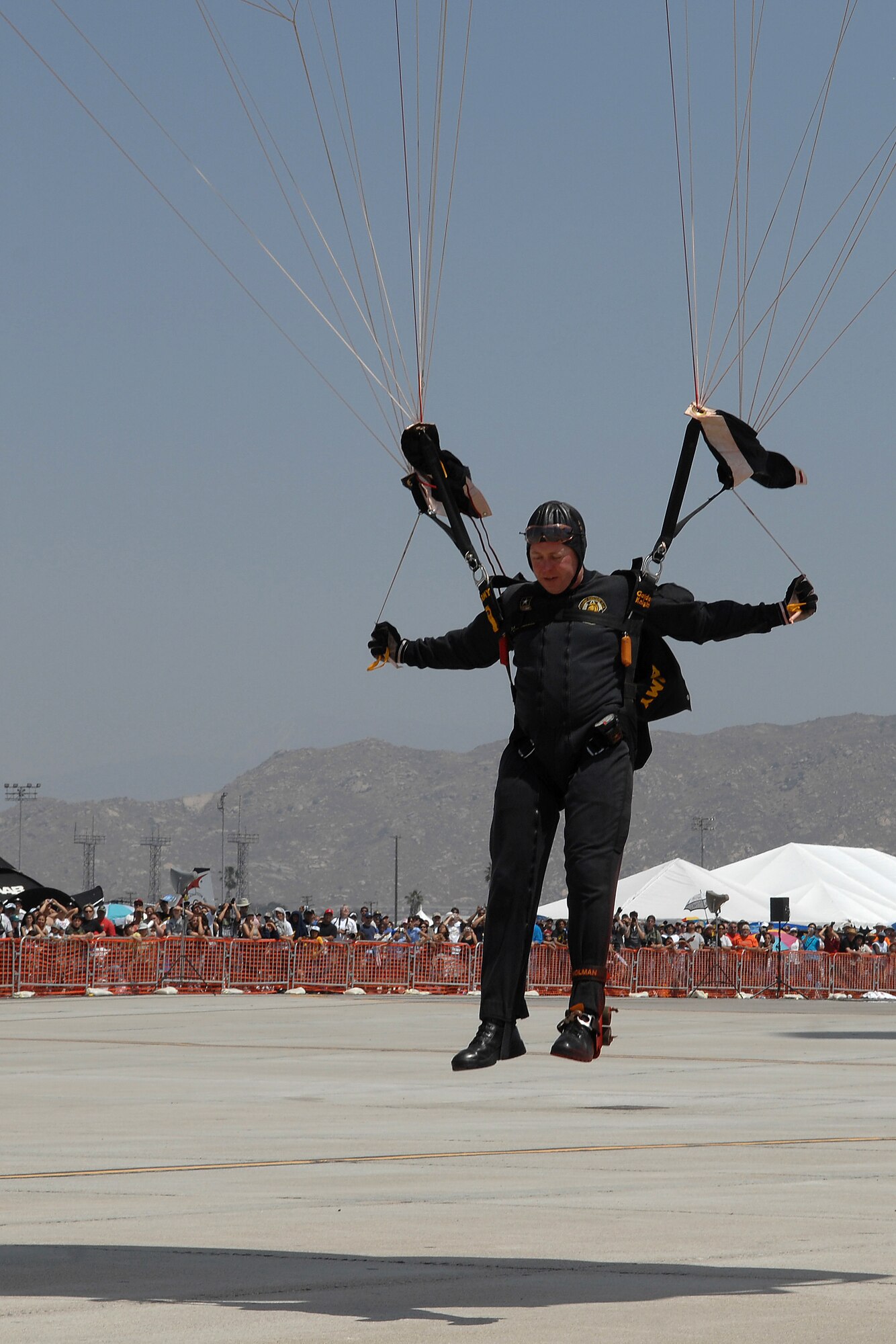 A member of the U.S. Army "Golden Knights" Parachute team prepares to make his landing. AirFest '08 featured both military and civilian aerial and ground demonstrations during the two day air show, May 3-4, 2008 at March Air Reserve Base, Riverside, California. (U.S. Air Force photo by SrA Matthew Smith)