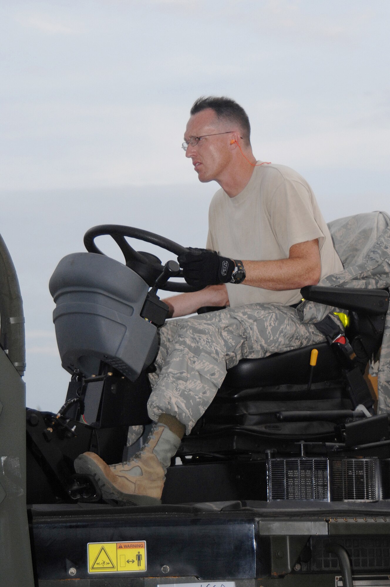 Utapao, Thailand - Technical Sgt Tracey Johnston, 36th Contingency Response Group, operates a forklift during the downloading of humanitarian relief supplies from a Boeing 747 commercial airplane for delivery into Burma May 16. TSgt Johnston is one of 45 members forward deployed from Andersen AFB, Guam trained and prepared to respond quickly to disasters such as Cyclone Nargis. (USAF photo/Senior Airman Sonya Croston)(RELEASED)