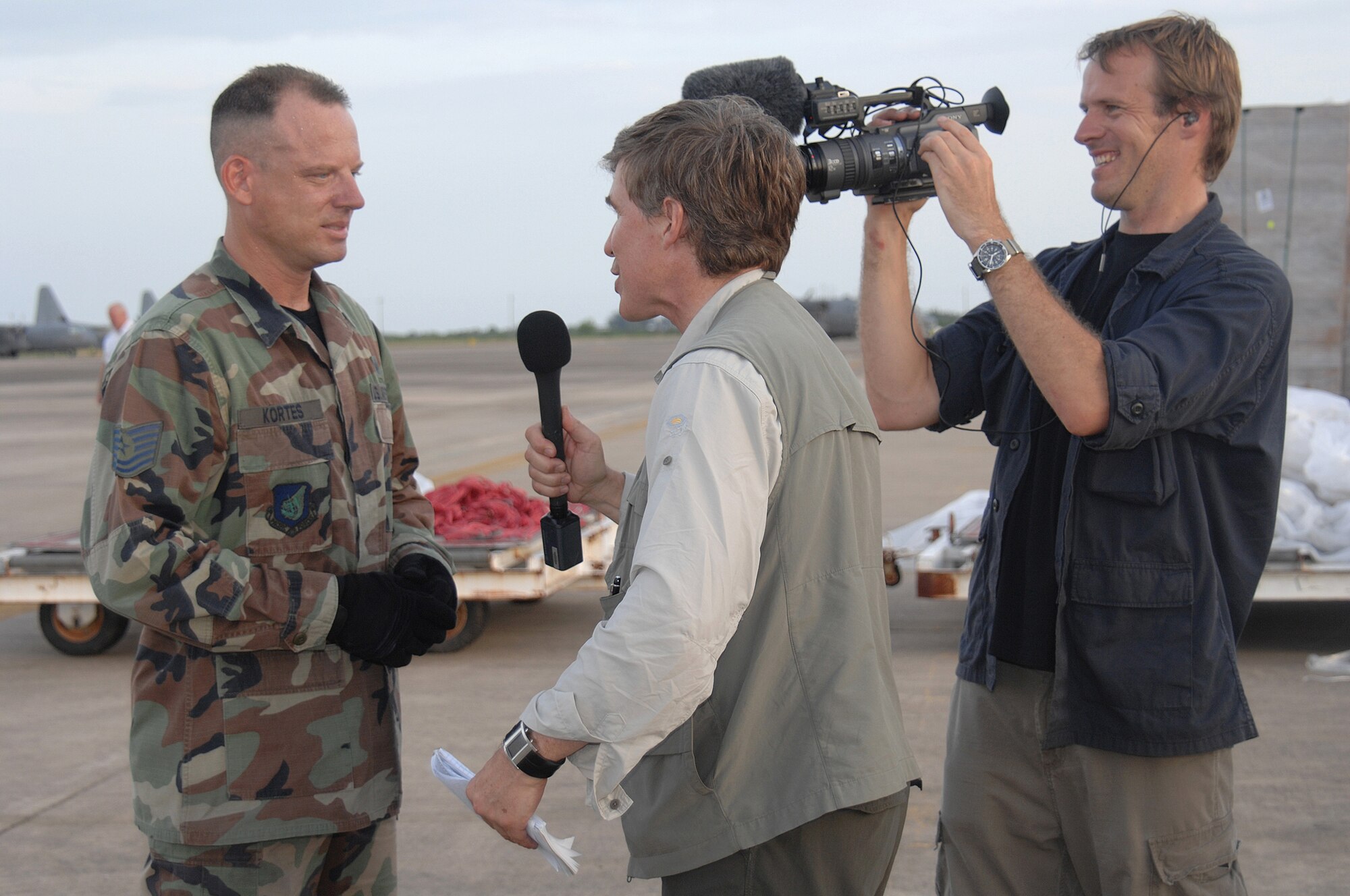 Utapao, Thailand - Technical Sgt John Kortez is interviewed by FOX News correspondents on the relief efforts being made by military personnel to the people of Burma May 16. (USAF photo/Senior Airman Sonya Croston)(RELEASED)