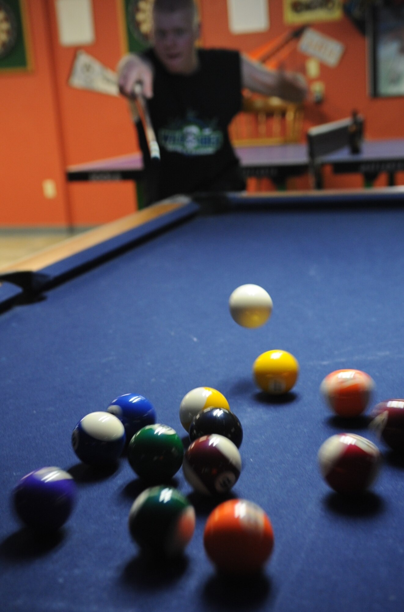 Airman Richard Wyrick, 28th Bomb Wing, 28th Aircraft Maintenance Squadron aircraft armament system specialist, Ellsworth Air Force Base, S.D., starts off a new game with a solid break during the first Airmen Billiards tournament at the Black Hills Community Center; May 7, 2008.  The tournament began May 7 and will run through June 25, finals begin June 28. (U.S. Air Force photo/Senior Airman Anthony Sanchelli)
