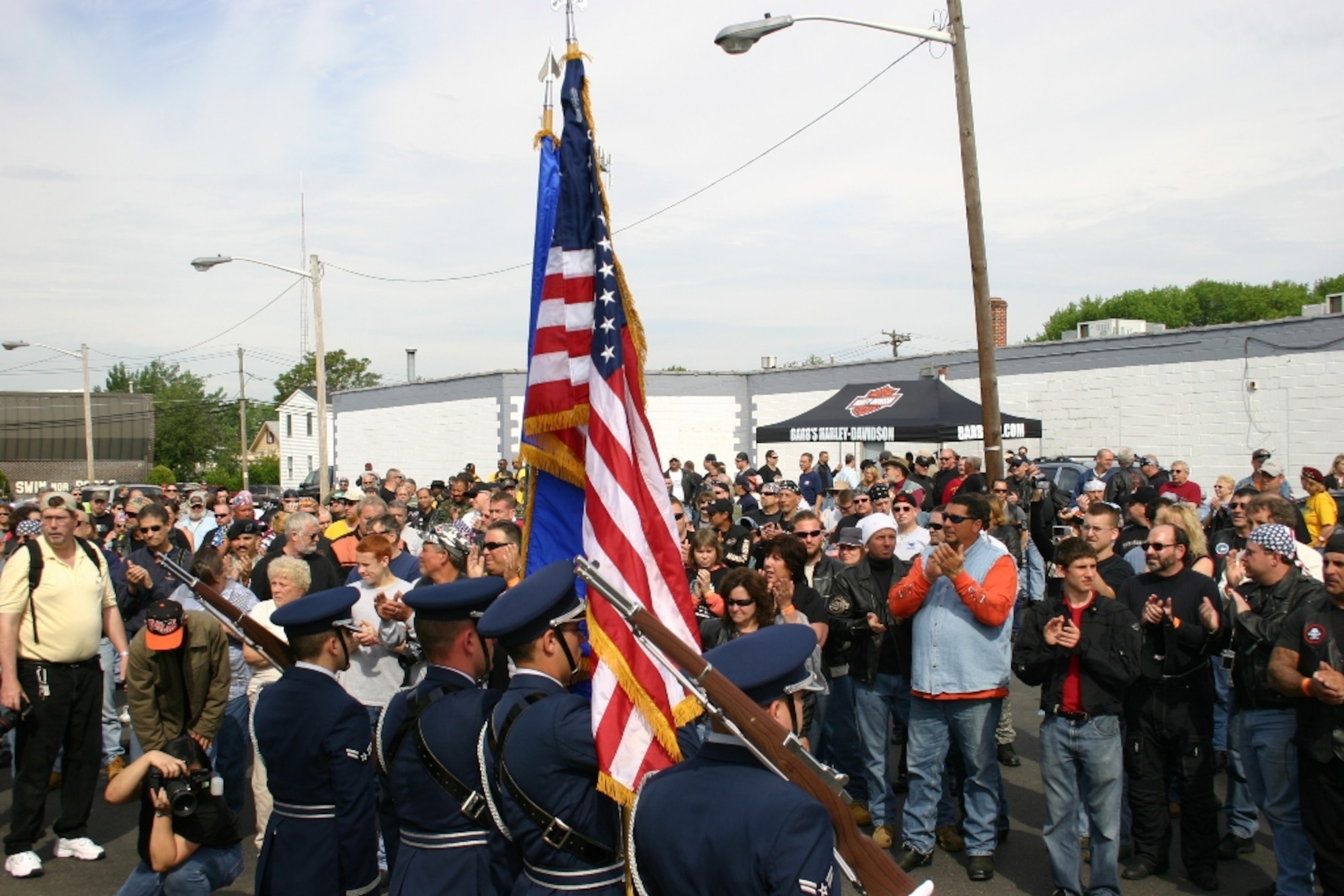 An Honor Guard detail from McGuire Air Force Base stands at attention during the opening ceremony for the second annual Armed Force’s Freedom Ride on May 18. Over 950 motorcycle riders particpated in the Freedom Ride which took them from Collingswood, NJ through historic downtown Mt. Holly, NJ and onto McGuire Air Force Base where the riders had the opportunity to ride down one of the aircraft runways. The Freedom Ride was organized to support the men and women of the armed forces and those who have give the ultimate sacrifice. (U.S. Air Force Photo/Master Sgt. Dwayne Gordon)