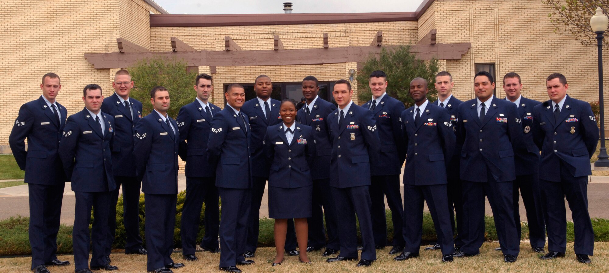 CANNON AIR FORCE BASE, N.M. -- Airmen who graduated from Airman Leadership Course 2008-E gather in front of The Landing on May 5. Sixteen Airmen graduated from the course on May 15. (U.S. Air Force photo by Airman Maynelinne De La Cruz)