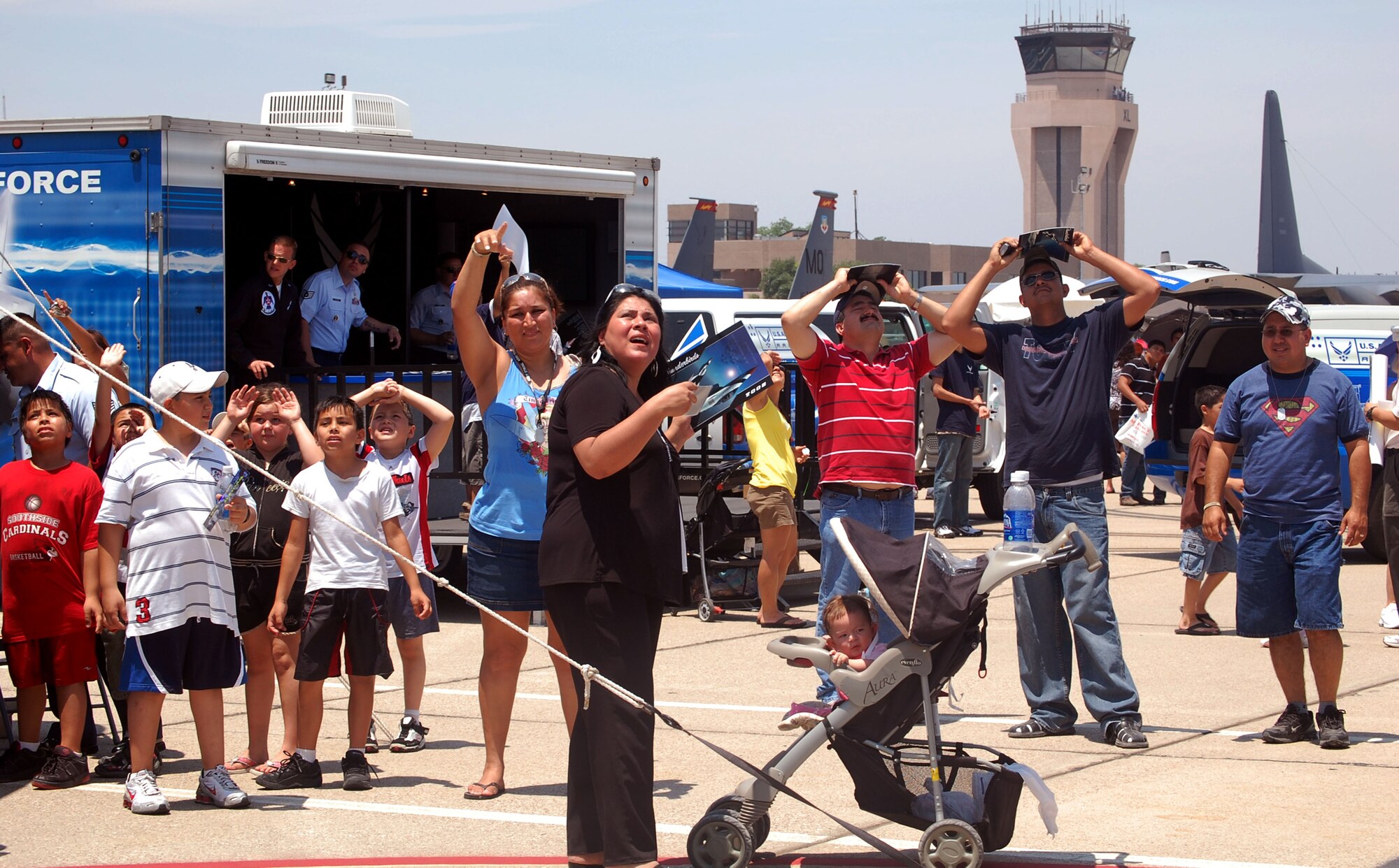 LAUGHLIN AIR FORCE BASE, Texas – The crowd at Thunder Over the Amistad air show here admires the Thunderbirds remarkable performance May 10. (U.S. Air Force photo by Airman 1st Class Sara Csurilla) 