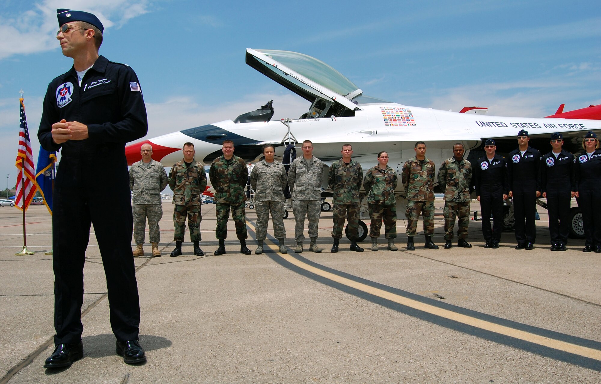 LAUGHLIN AIR FORCE BASE, Texas – Lt. Col. Greg Thomas, Thunderbird pilot and commander, shares some words of wisdom before re-enlisting a group of Airmen here, May 9. (U.S. Air Force photo by Airman 1st Class Sara Csurilla) 